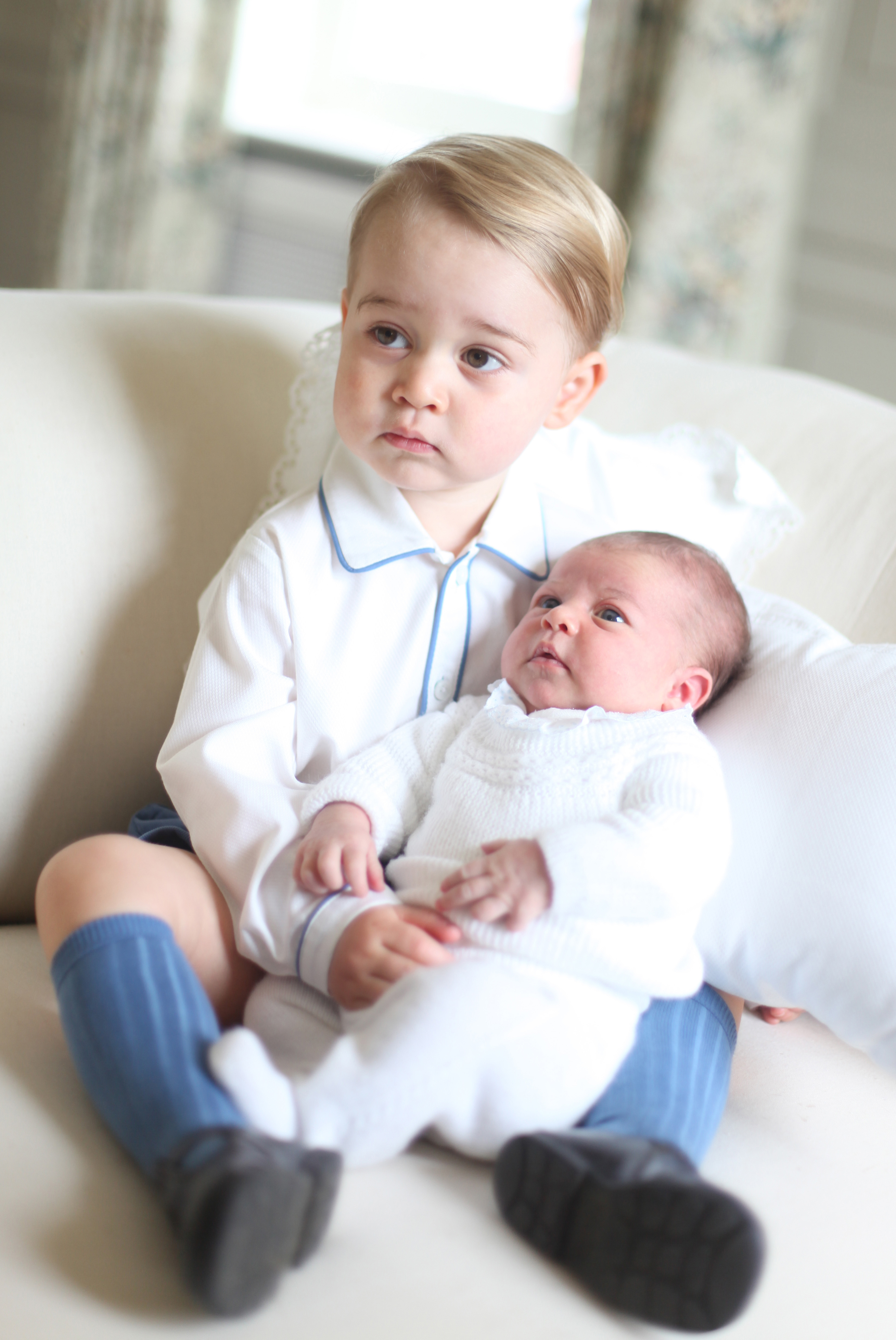 Prince George with Princess Charlotte 