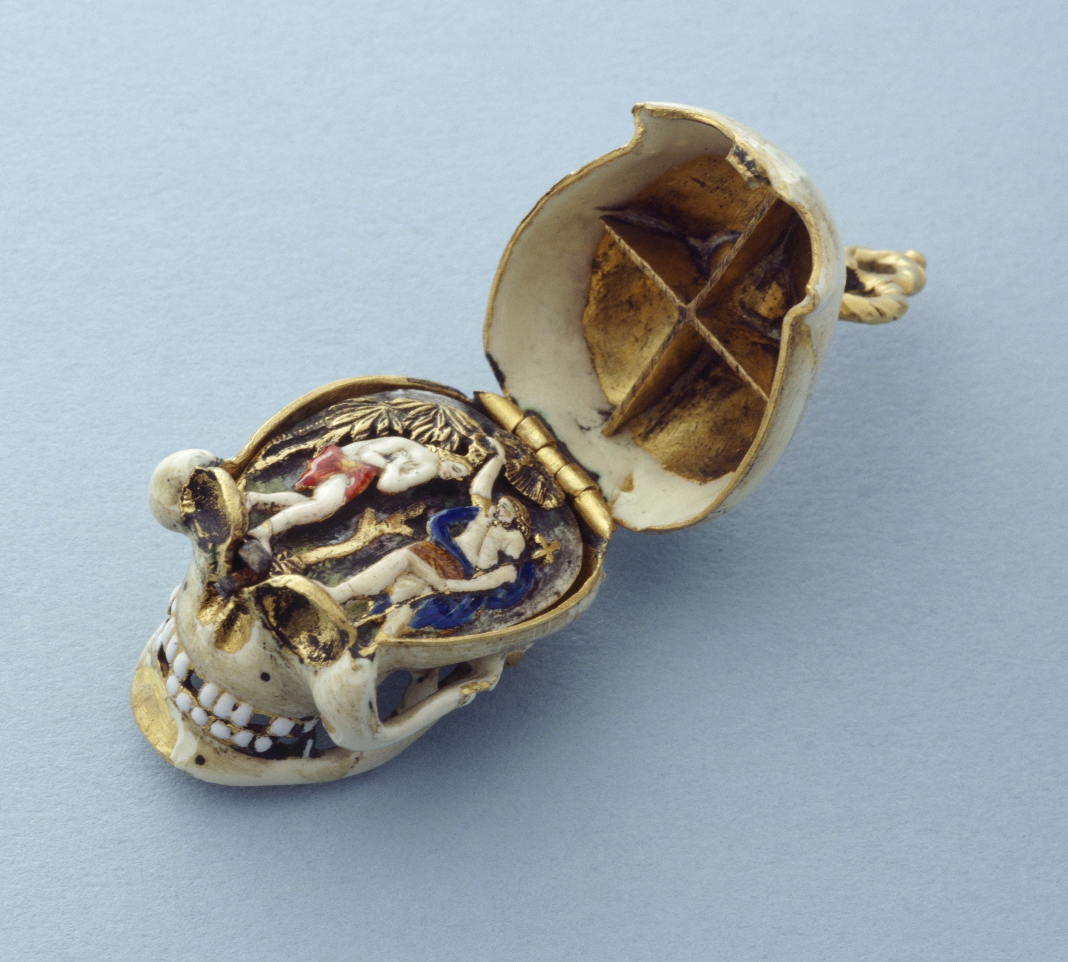 Enamelled skull pomander with Baptism of Christ plaque (skull open) (Trustees of the Wernher Collection)