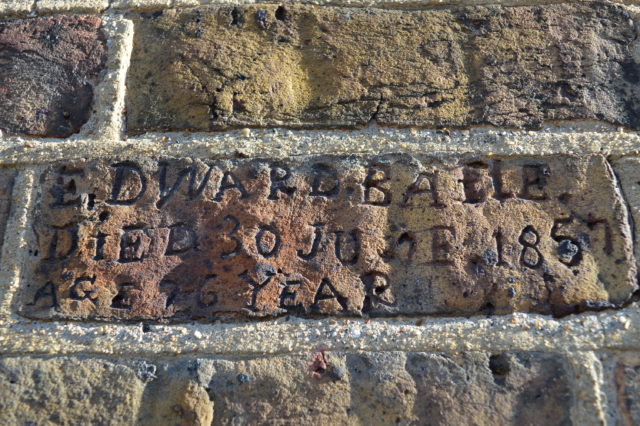 The names of inmates who died are etched into the bricks at Watford Workhouse (Lynda Bullock/PA)