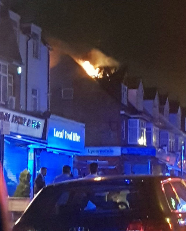 The fire destroyed the roof and second floor of the building" /> The fire destroyed the roof and second floor of the building’ srcset=”https://content.assets.pressassociation.io/2018/07/29024735/1ae897e5-bea0-4974-87f9-5bf73ed72971-640×791.jpg 640w, https://content.assets.pressassociation.io/2018/07/29024735/1ae897e5-bea0-4974-87f9-5bf73ed72971-768×949.jpg 768w, https://content.assets.pressassociation.io/2018/07/29024735/1ae897e5-bea0-4974-87f9-5bf73ed72971.jpg 886w” sizes=”(max-width: 640px) 100vw, 640px”><figcaption>The fire destroyed the roof and second floor of the building (@Dipakotak/PA)</figcaption></figure>
</p>
<p>There were no reports of any injuries.</p>
<p>A spokesman for LFB said: “Eight fire engines and around 60 firefighters were called to a fire at a shop with flats above on Pinner Road, Harrow.</p>
<p>“The second floor and roof were destroyed by fire.</p>
<p>“Fire crews from Feltham, Ruislip, Harrow, Wembley and surrounding fire stations attended the scene.”</p>
<figure>
<blockquote class="twitter-tweet" data-width="525" data-dnt="true">
<p lang="en" dir="ltr"><a href="https://twitter.com/hashtag/harrowAteam?src=hash&ref_src=twsrc%5Etfw">#harrowAteam</a> and <a href="https://twitter.com/LondonFire?ref_src=twsrc%5Etfw">@LondonFire</a> dealing with a fire at a premises on Pinner Rd. Road closures in place, thankfully no injuries <a href="https://t.co/k849jJGORJ">pic.twitter.com/k849jJGORJ</a></p>
<p>— Harrow MPS (@MPSHarrow) <a href="https://twitter.com/MPSHarrow/status/1023373002661093376?ref_src=twsrc%5Etfw">July 29, 2018</a></p>
</blockquote>
<p><script async src="//platform.twitter.com/widgets.js" charset="utf-8"></script></figure>
</p>
<p>The fire service was called at just before 10.10pm on Saturday, and the blaze was under control by just before 12.40am on Sunday.</p>
<p>The cause of the fire is now under investigation.</p>
</div>

	<div id="wp-block-ads-block-block_65eece0b11412" class="wp-block-ps-ads-script">
		<!-- GPT AdSlot 1 for Ad unit 