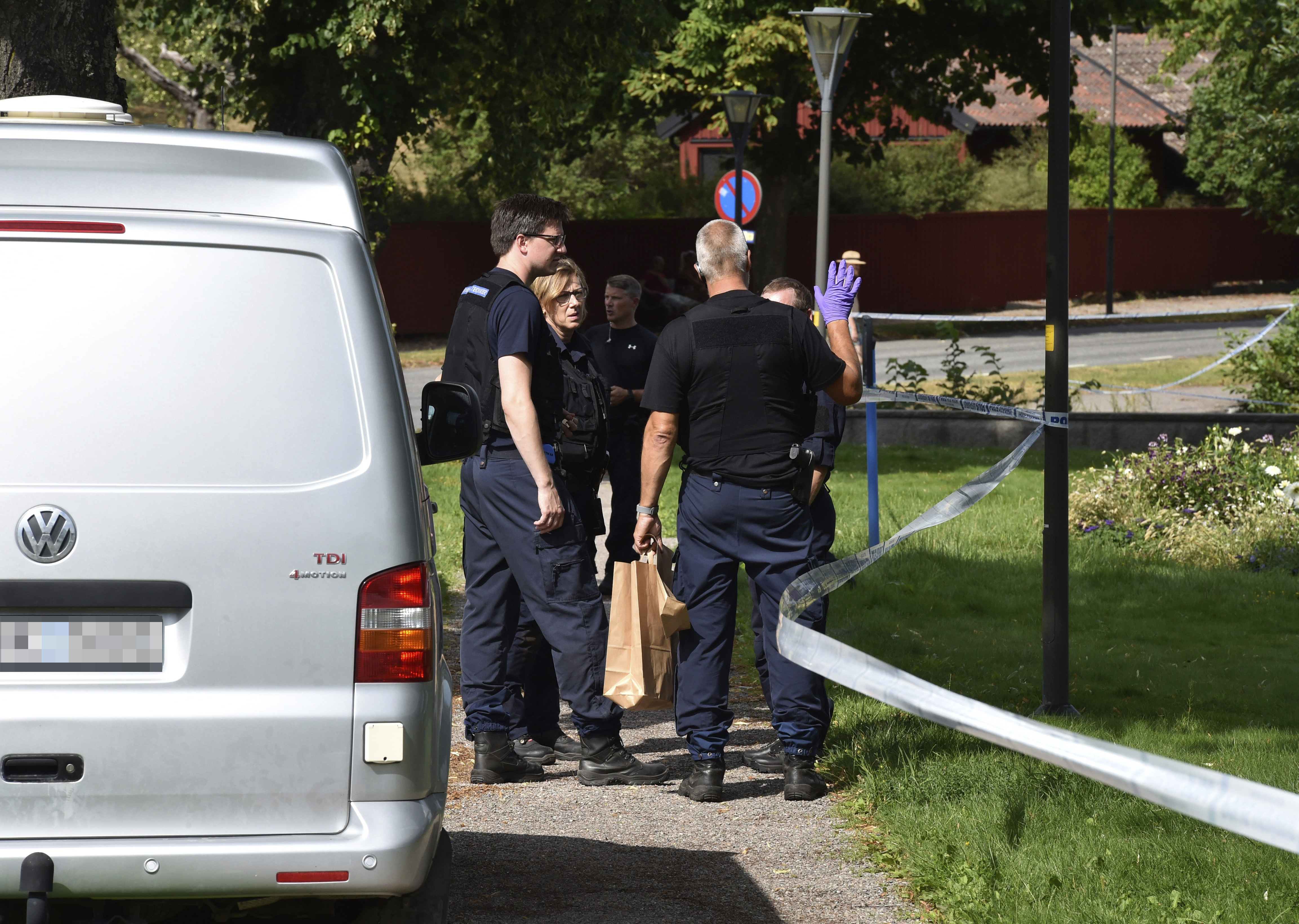 Police near the scene of a robbery at Strangnas Cathedral in Sweden