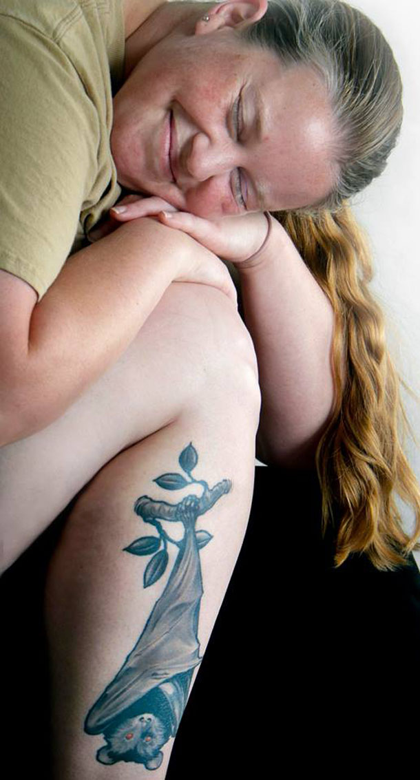 Zookeeper Shana with her fruitbat tattoo