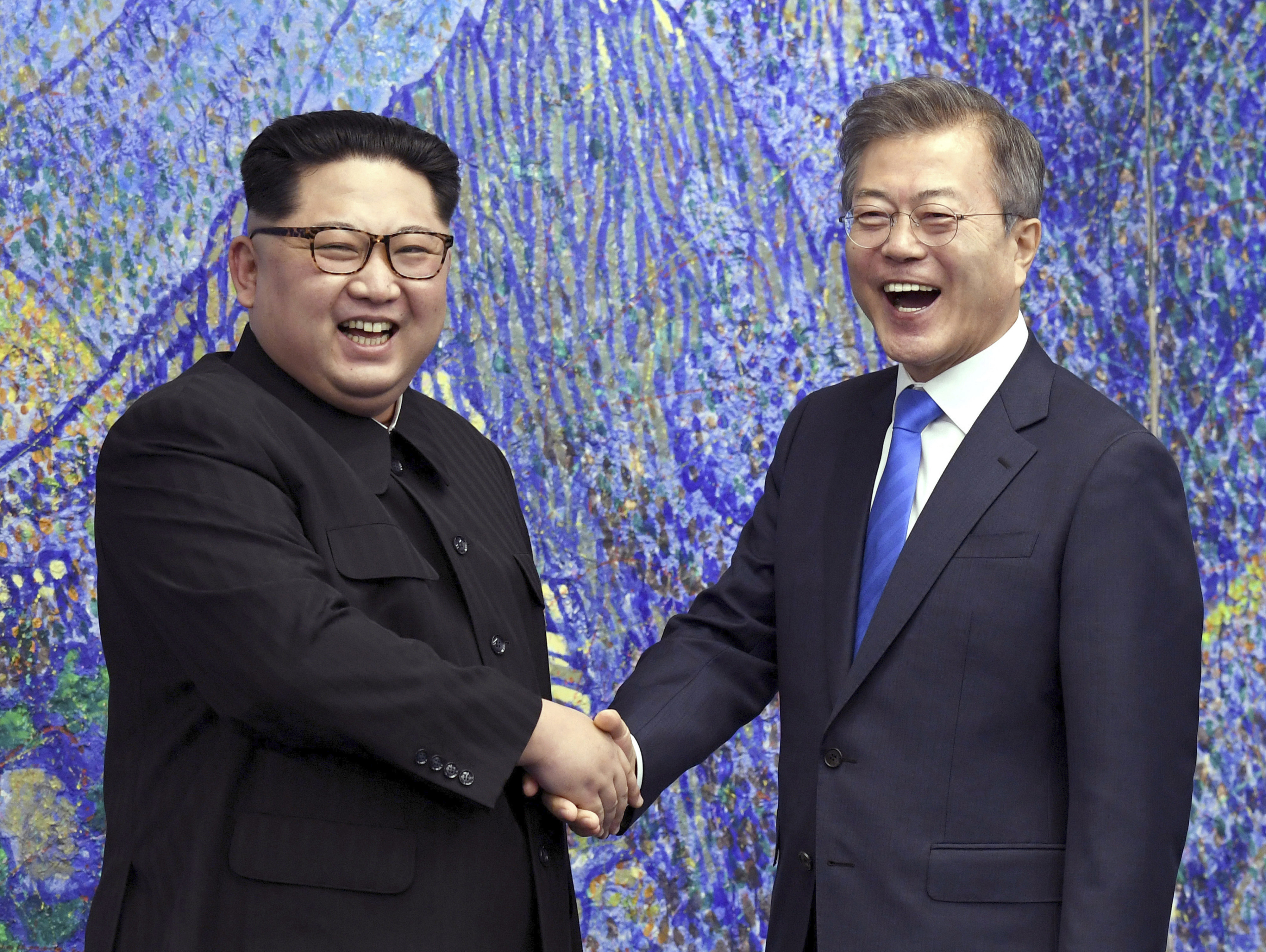 North Korean leader Kim Jong Un, left, with South Korean President Moon Jae-in