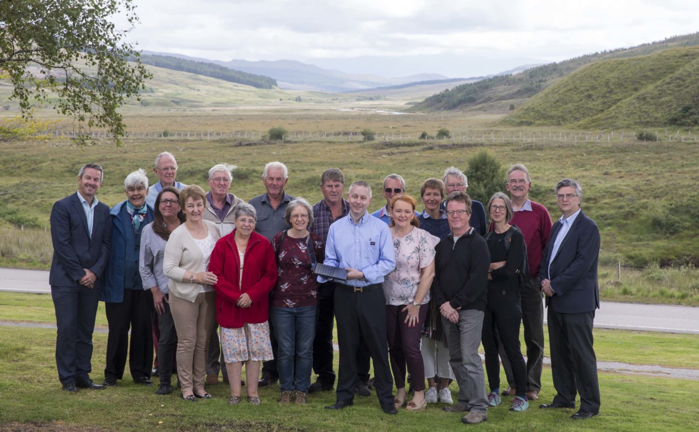 The community launches their unique broadband partnership in Achnasheen with Openreach’s Robert Thorburn (far left); HIE’s Stuart Robertson (far right) and Ledgowan Lodge Hotel’s Craig Duffield (centre).