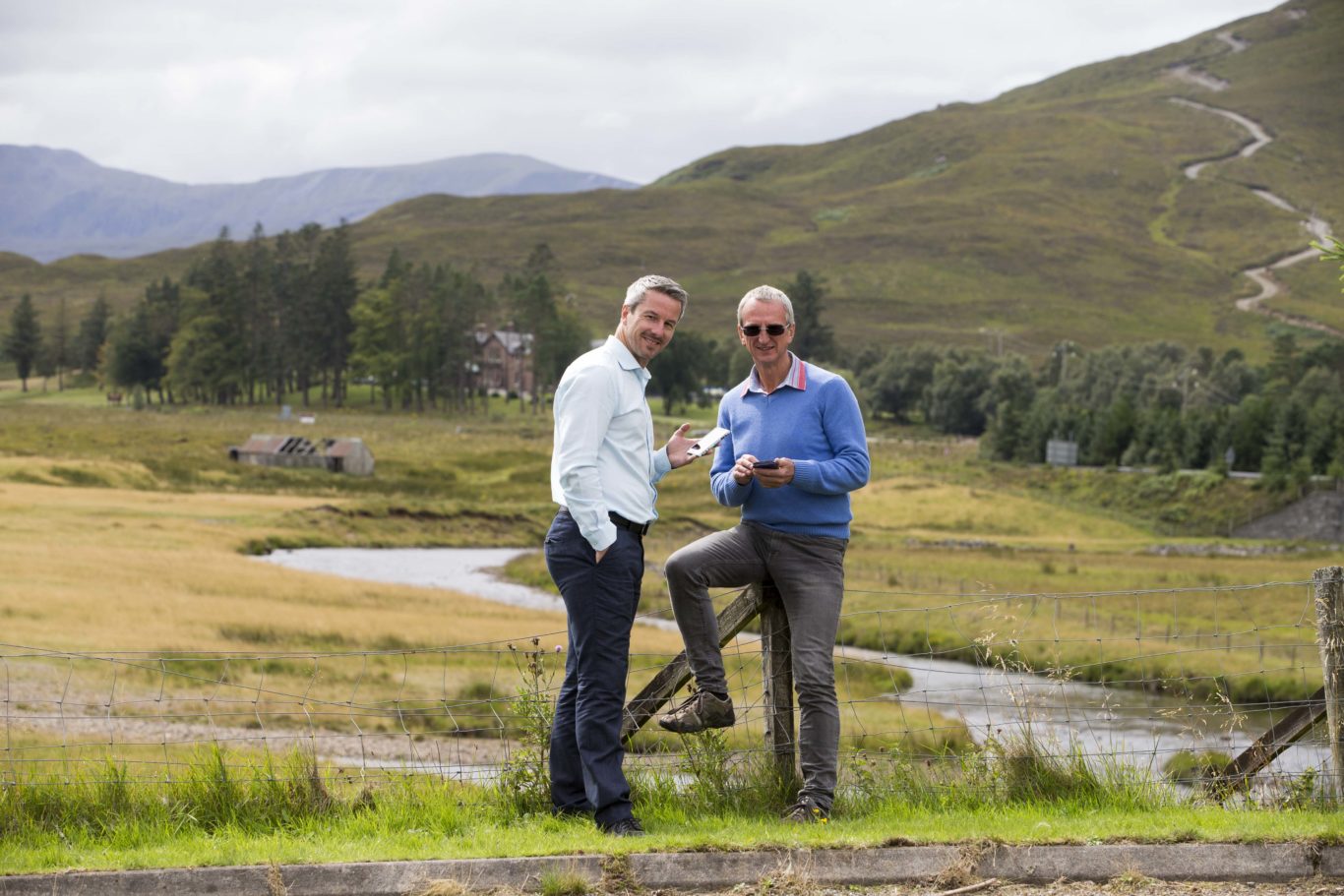 Openreach’s Rob Thorburn and community spokesman Steve Jones in the village of Achnasheen.