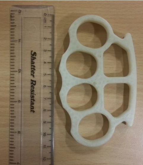 3D-printed knuckle duster used by Adrian Grey and measuring ruler 