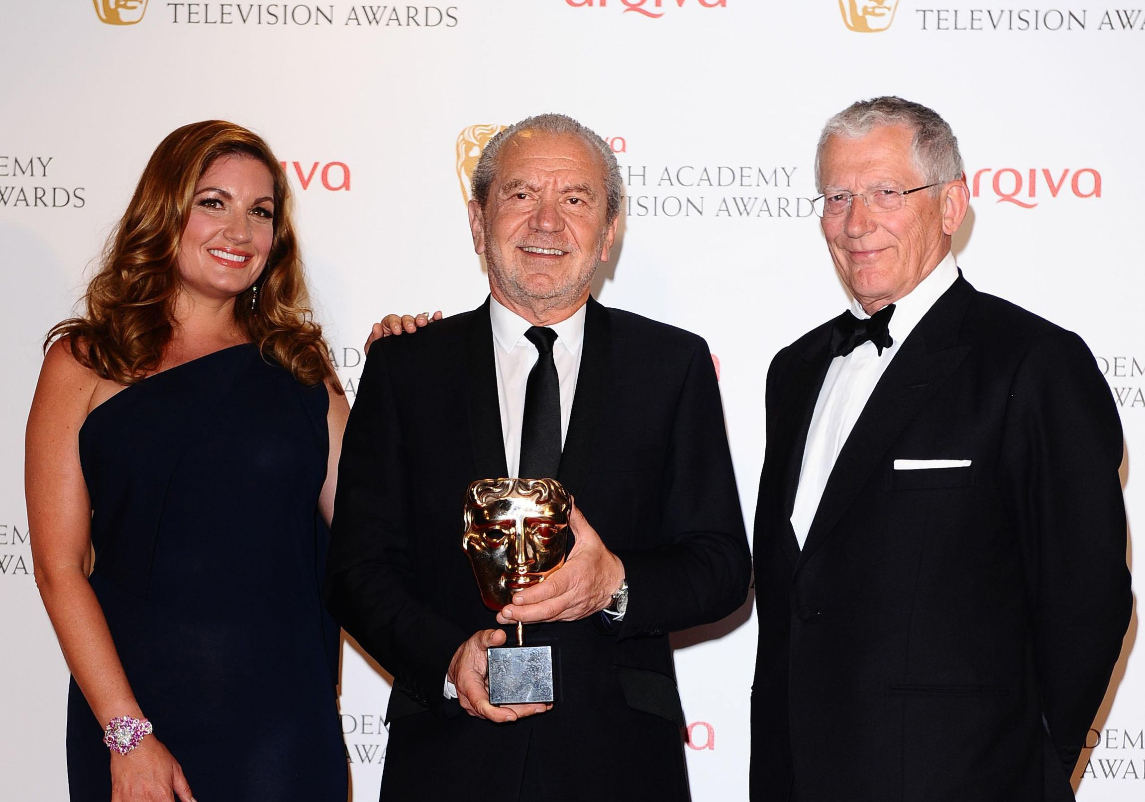 Nick Hewer (right) during his Apprentice days with Lord Sugar and Karren Brady (Ian West/PA)