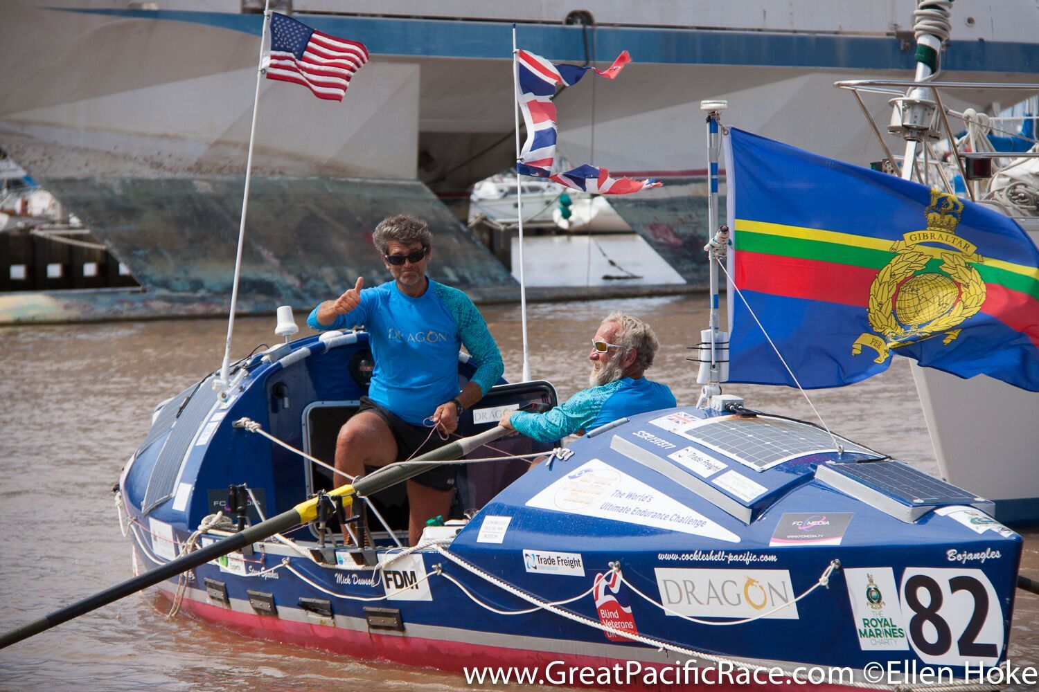 Steve Sparkes and Mick Dawson inside their boat Bojangles in Honolulu, Hawaii