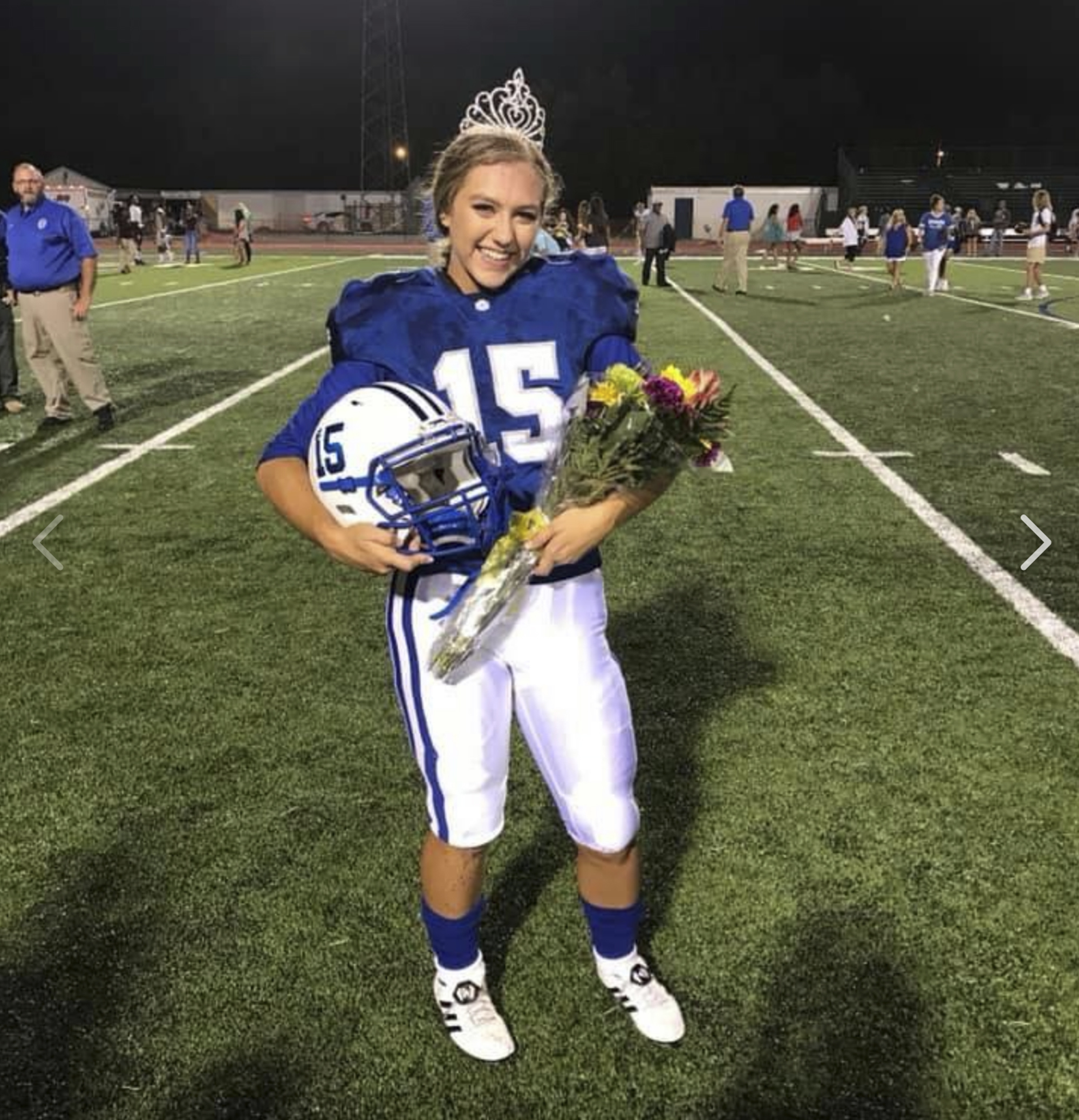 Ocean Springs High School’s 2018 Homecoming Queen Kaylee Foster holds her football helmet