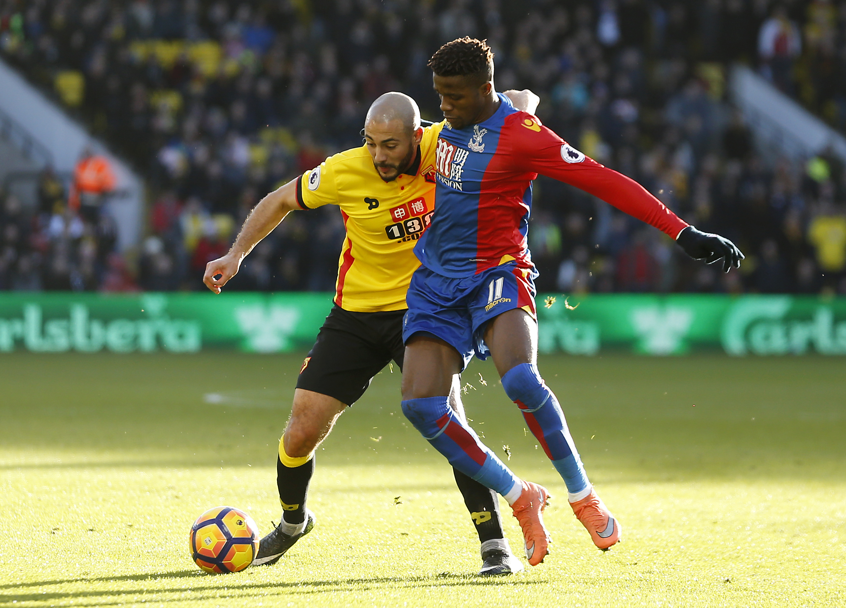 Wilfried Zaha plays against Watford in a Premier League match