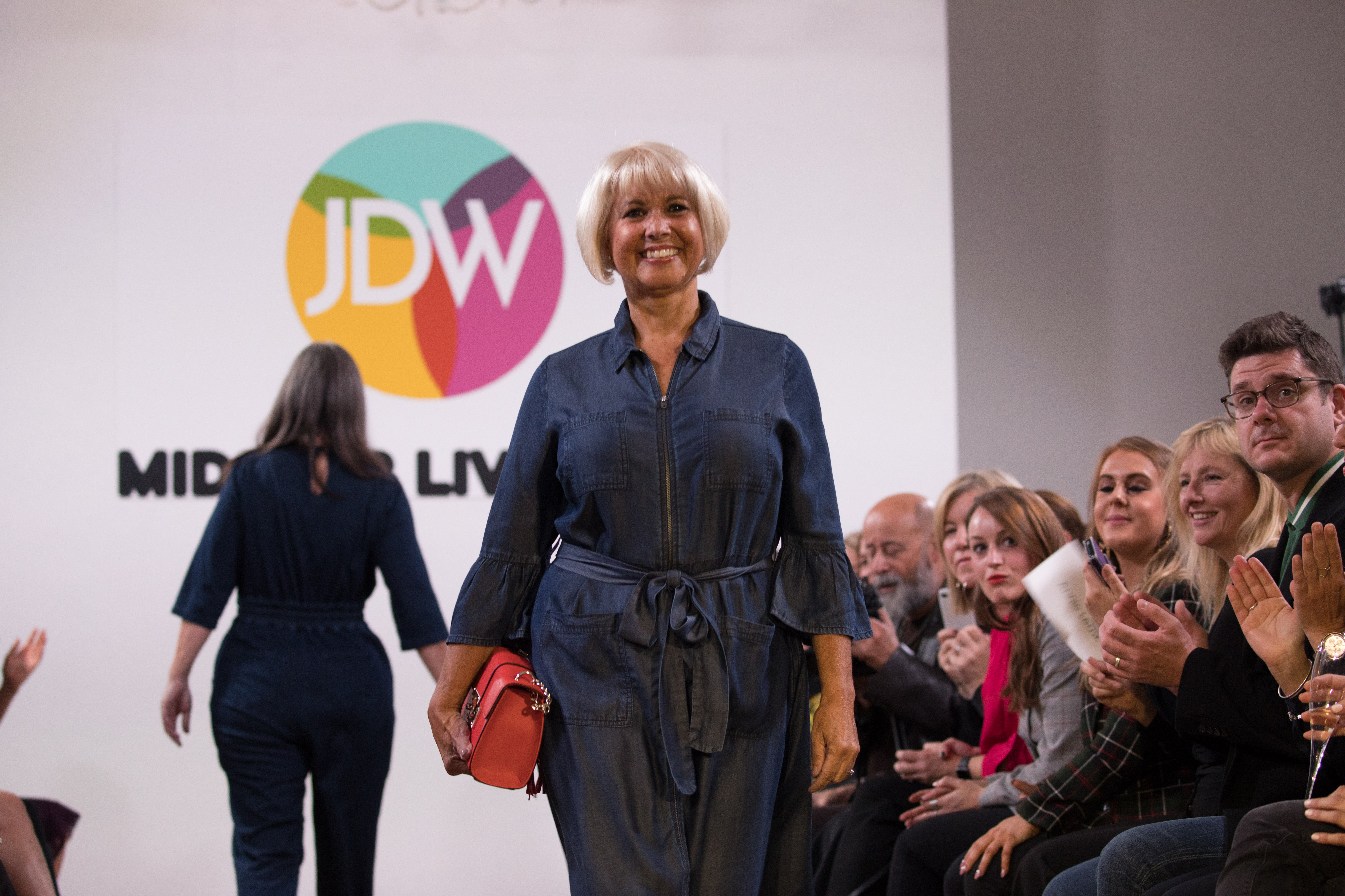 Midster model search winner Sue Hammond-Doutre walks the JD Williams Midster catwalk