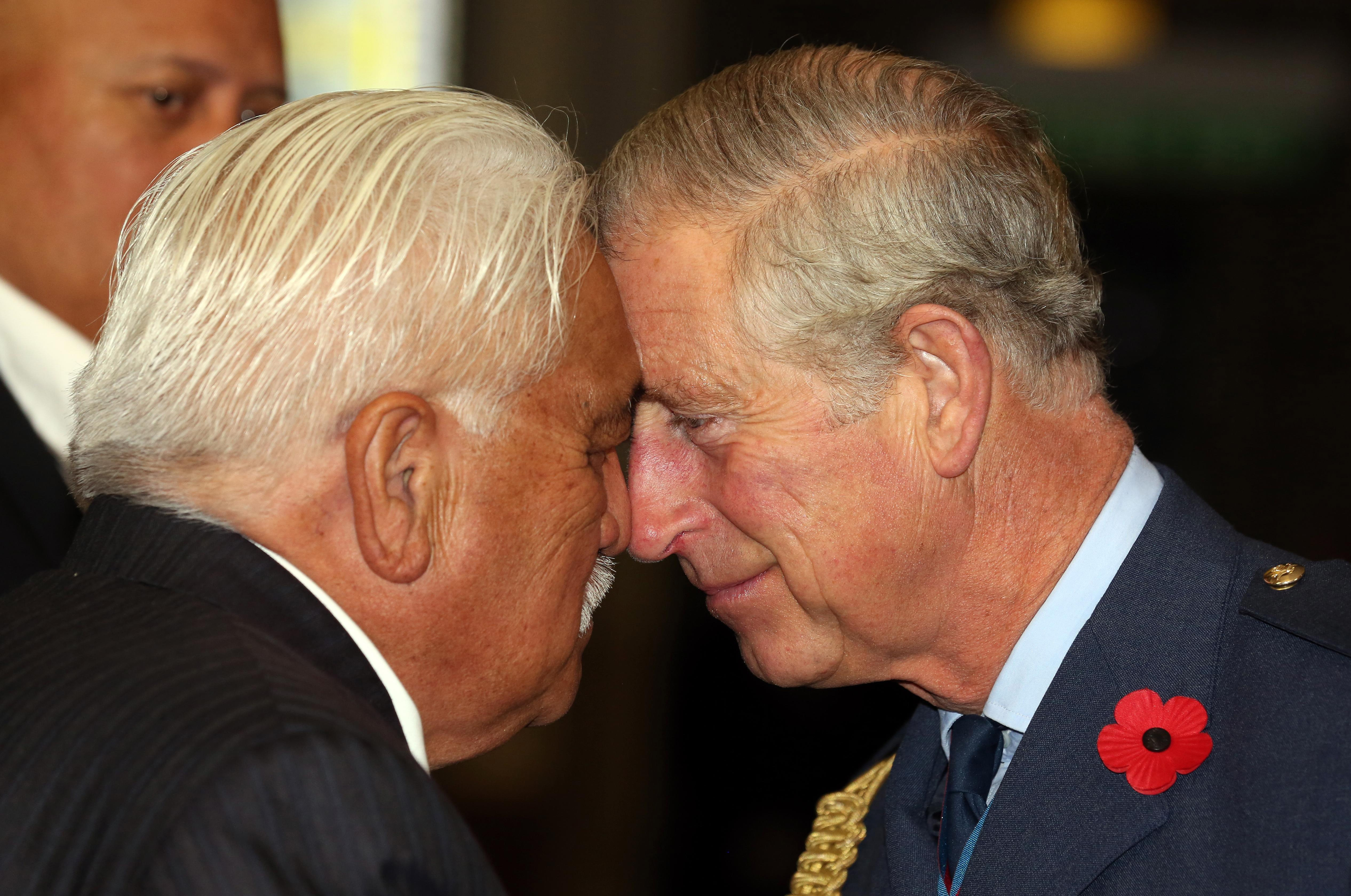 Charles is greeted with a hongi by Grant Hawke during a welcome ceremony at Auckland War Memorial Museum in New Zealand in 2012