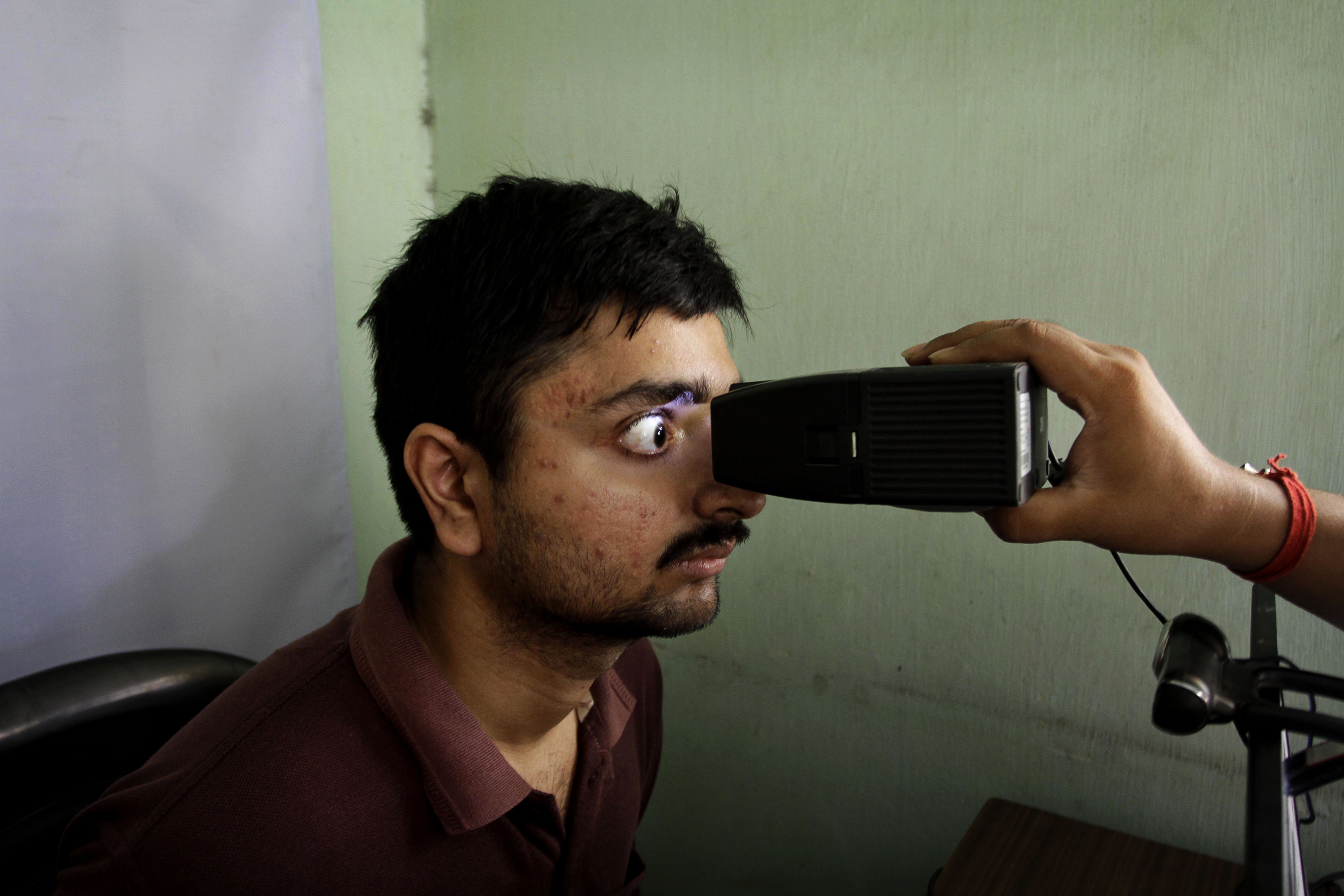 A man gets his retina scanned
