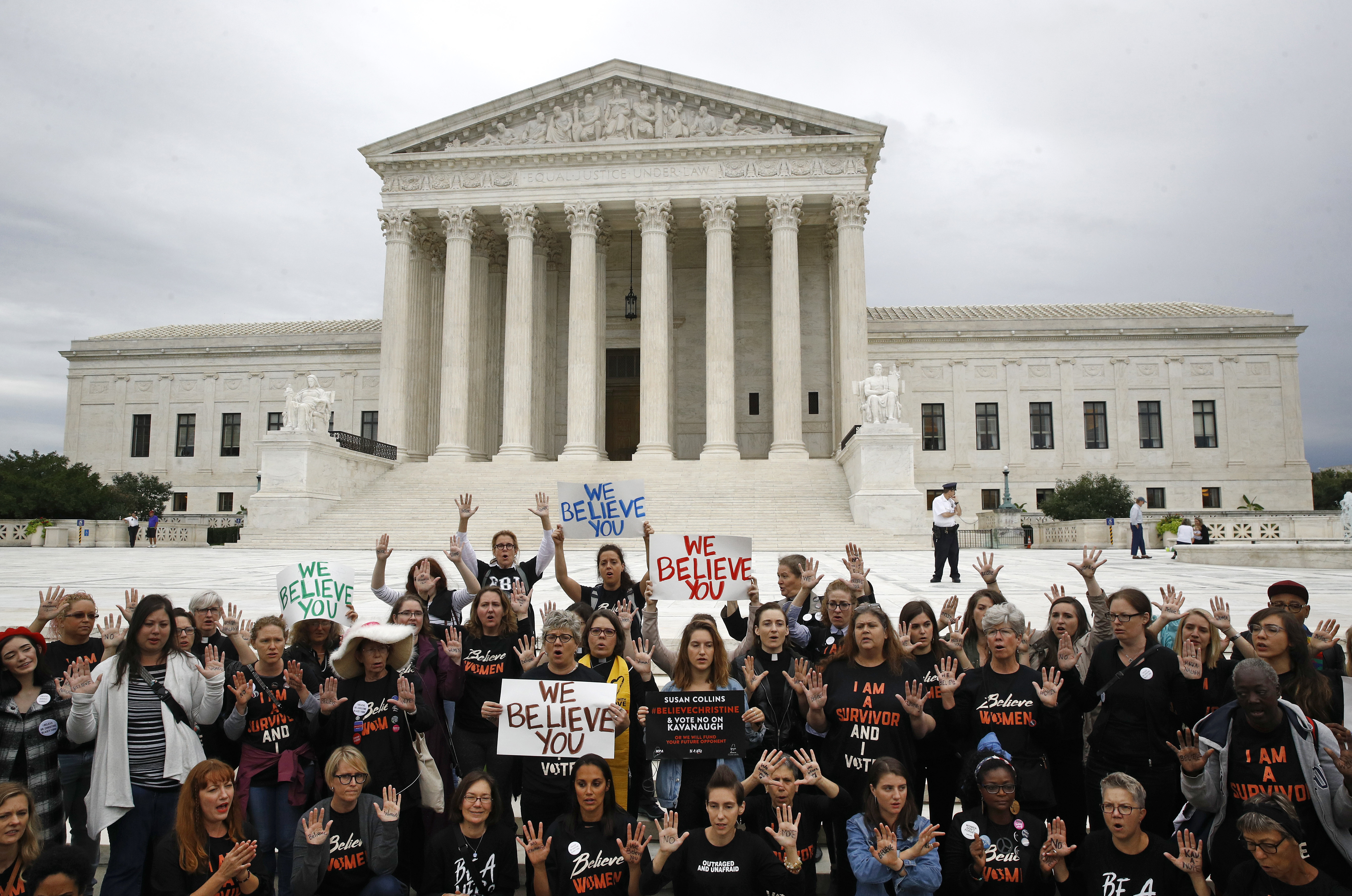 Protesters gather in front of the Supreme Court on Capitol Hill in Washington