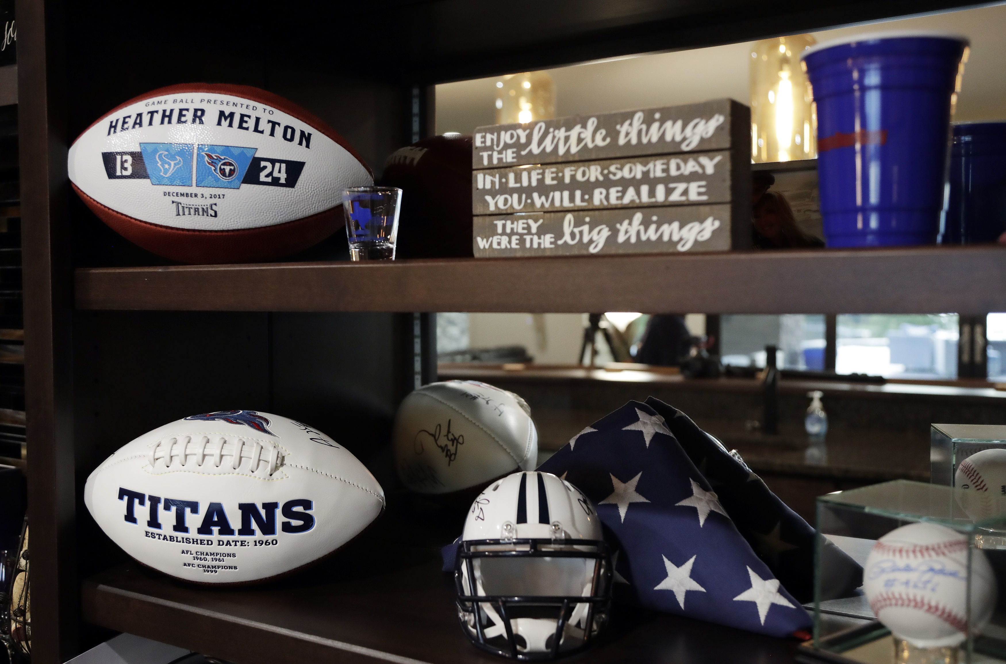 American footballs given to Heather Melton by the Tennessee Titans