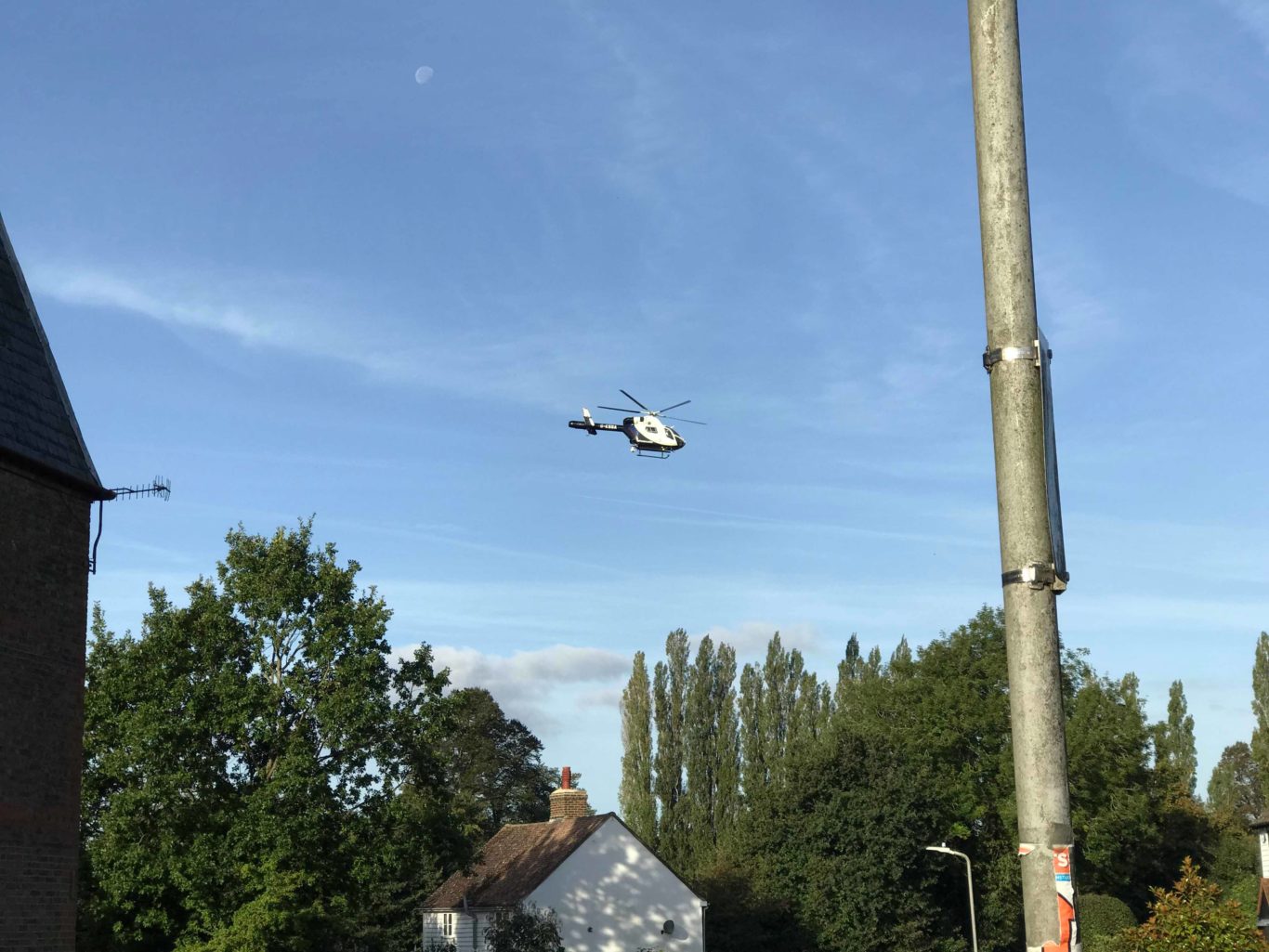 A helicopter flies overhead (Sophie Moorey-Brwon/PA)