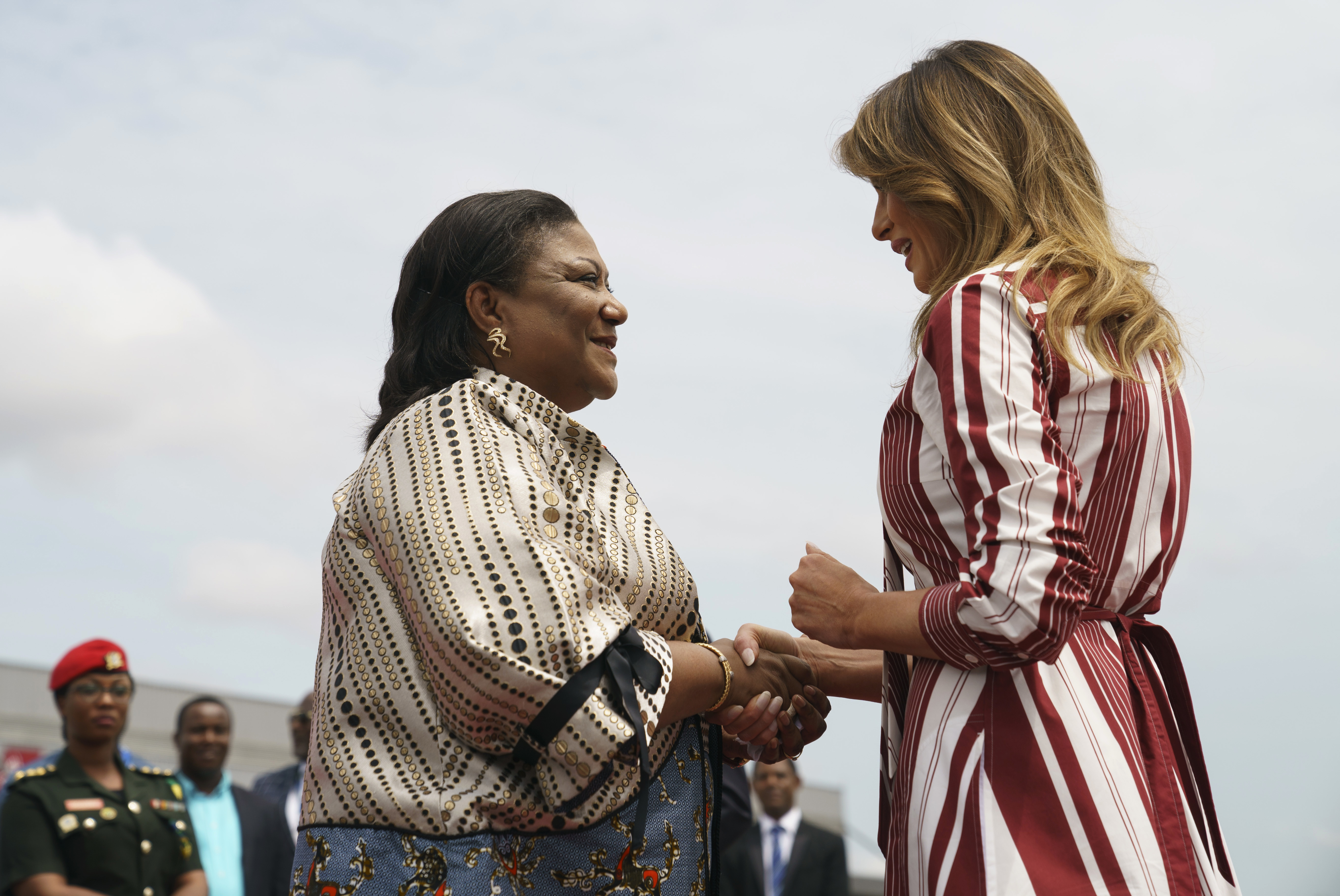 First lady Melania Trump is greeted by Ghana's first lady Rebecca Akufo-Addo