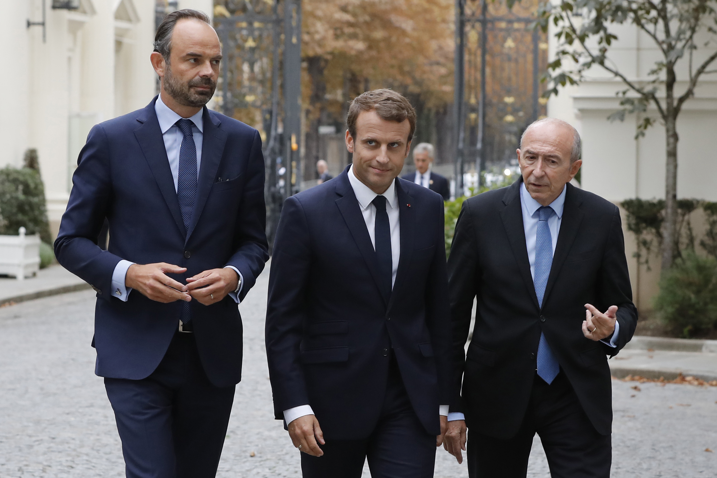 Edouard Philippe, left, Emmanuel Macron and Gerard Collomb 