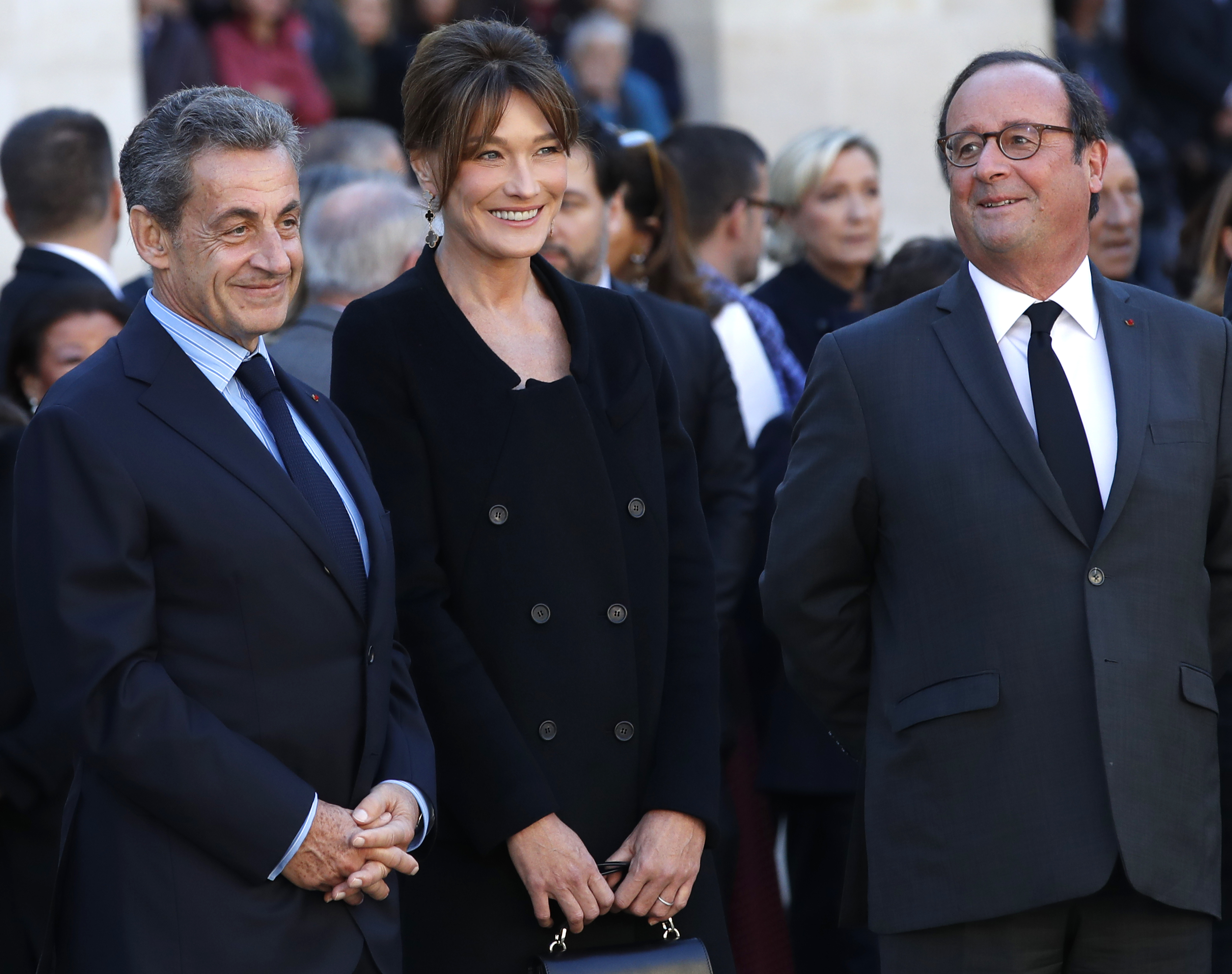 Nicolas Sarkozy, left, his wife Carla Bruni Sarkozy and Francois Hollande