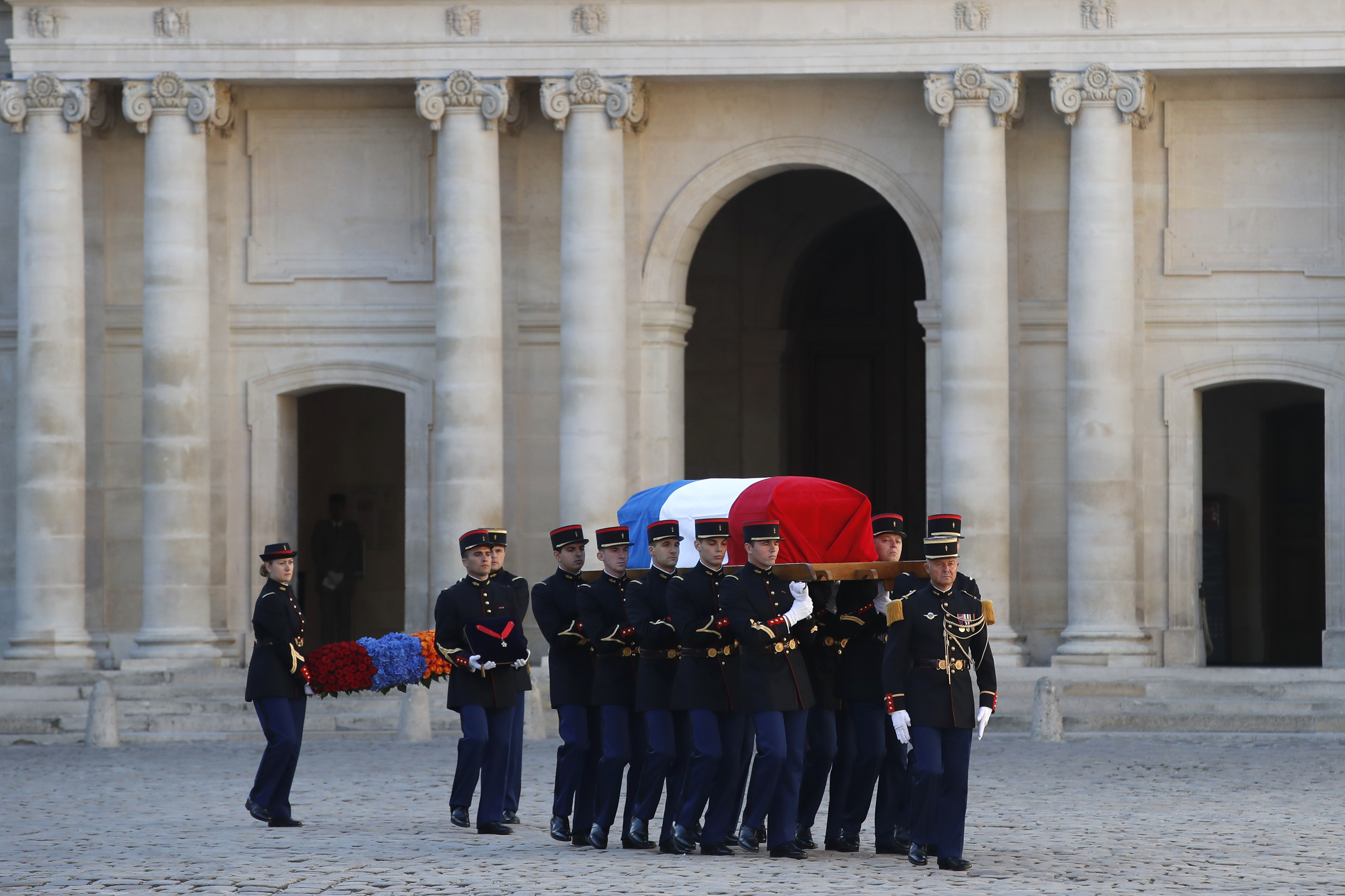 Soldiers carry the coffin of Charles Aznavour during a ceremony in Paris