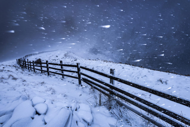 Blizzard in the High Peak, Derbyshire, England, by John Finney, was one of the category winners (John Finney/Landscape Photographer of the Year/PA)