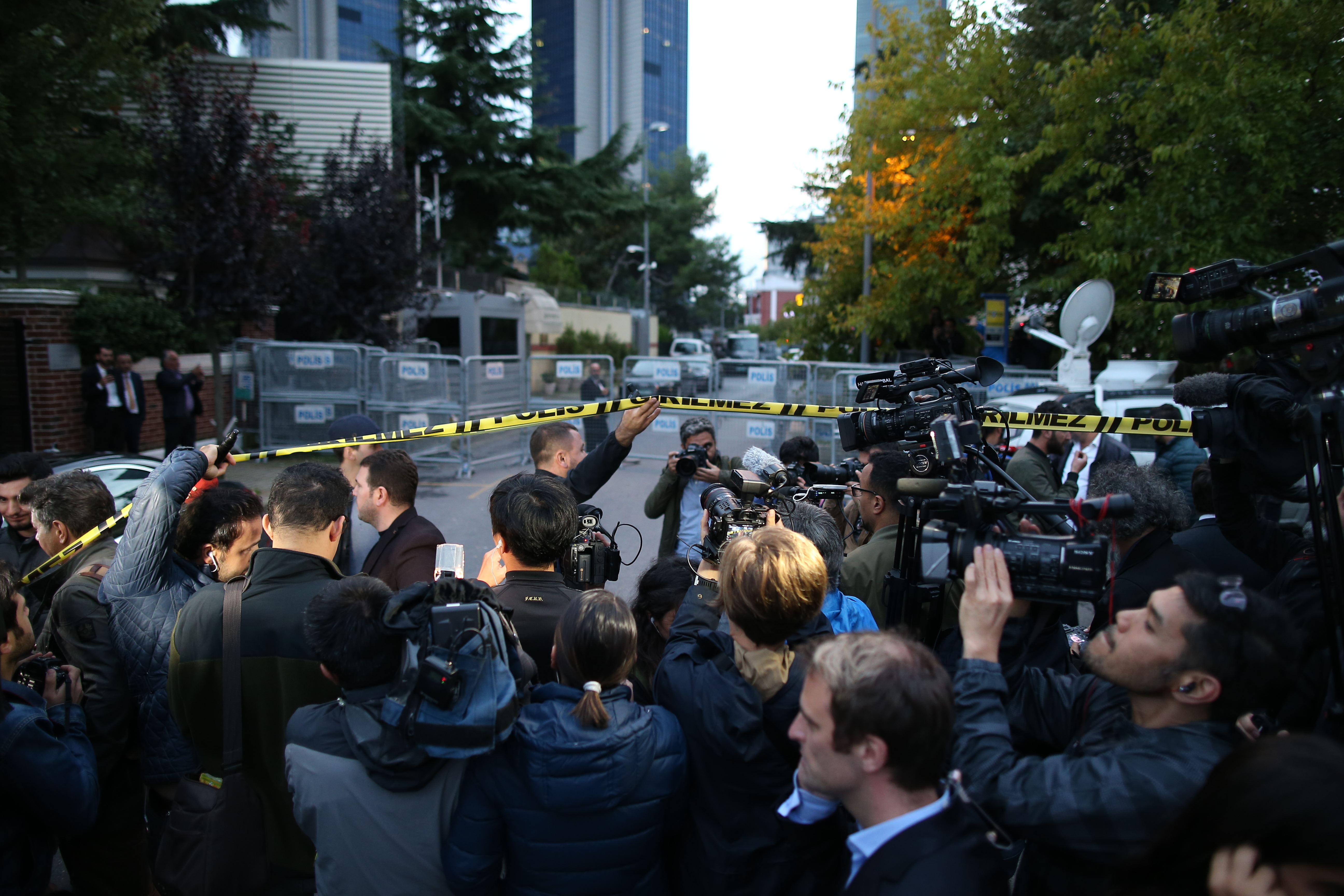 Members of the media on the blocked road leading to Saudi Arabia's consulate in Istanbul 