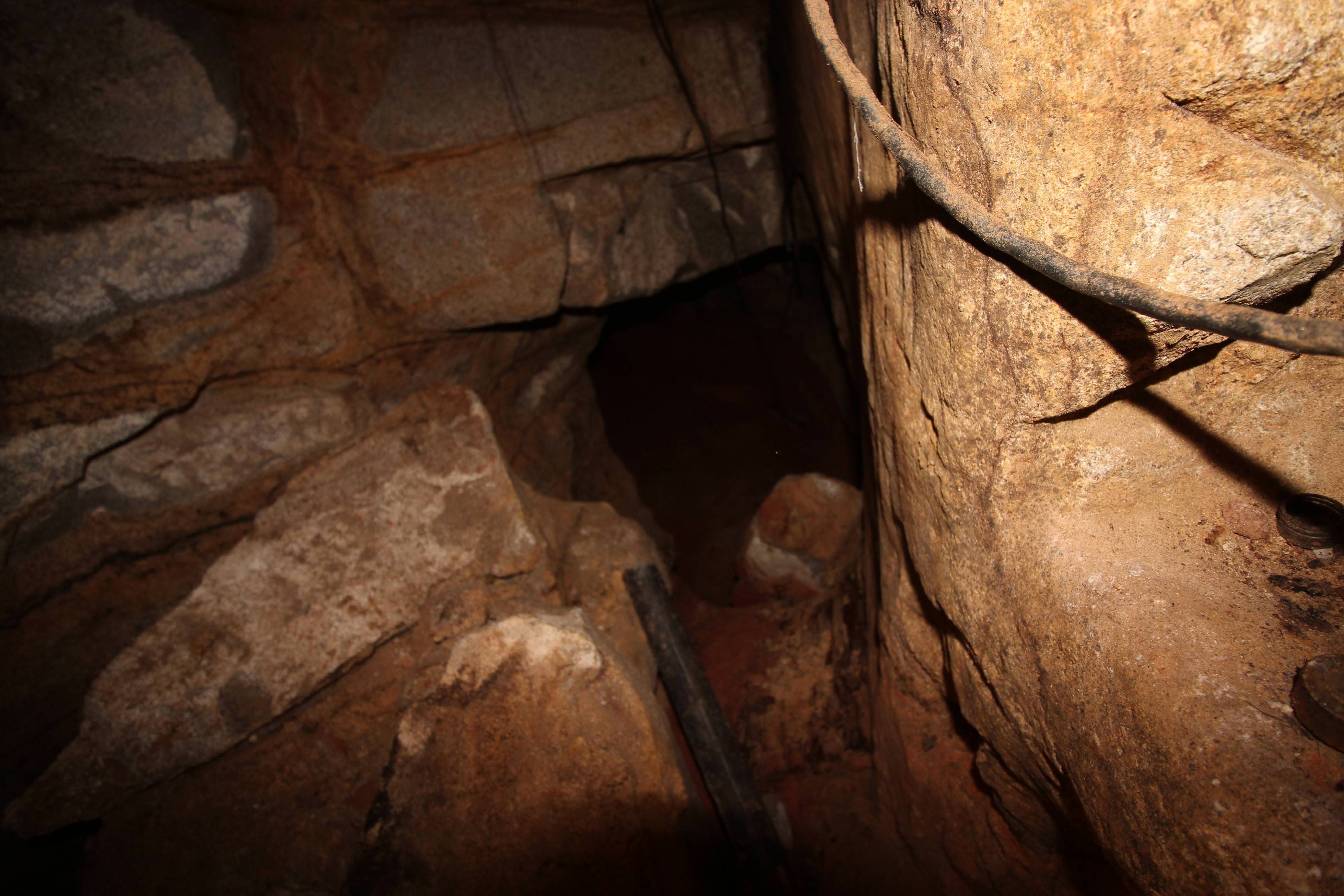 Crumbling rock within the shelter