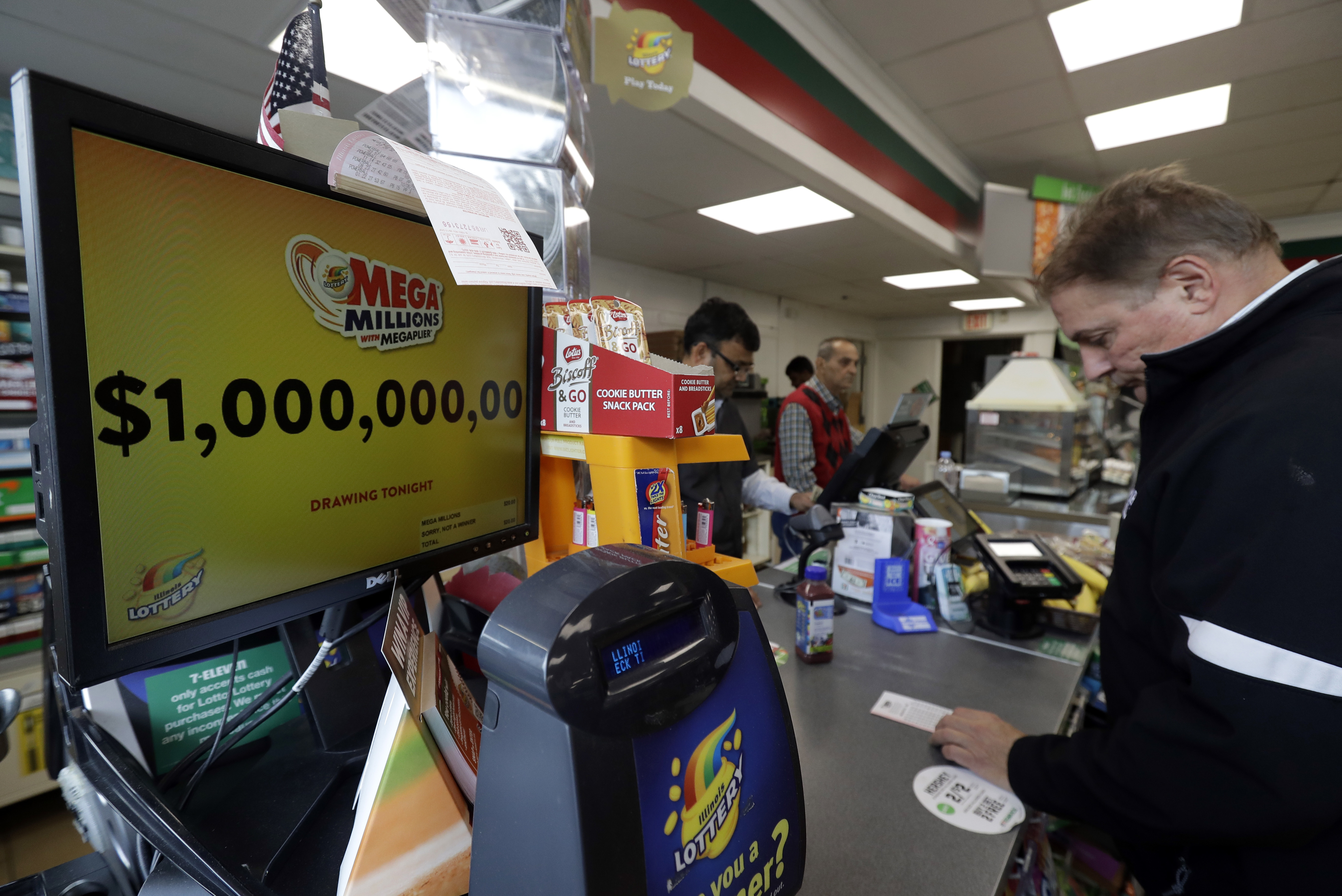 A sign displays the estimated Mega Millions jackpot at a convenience store in Chicago 