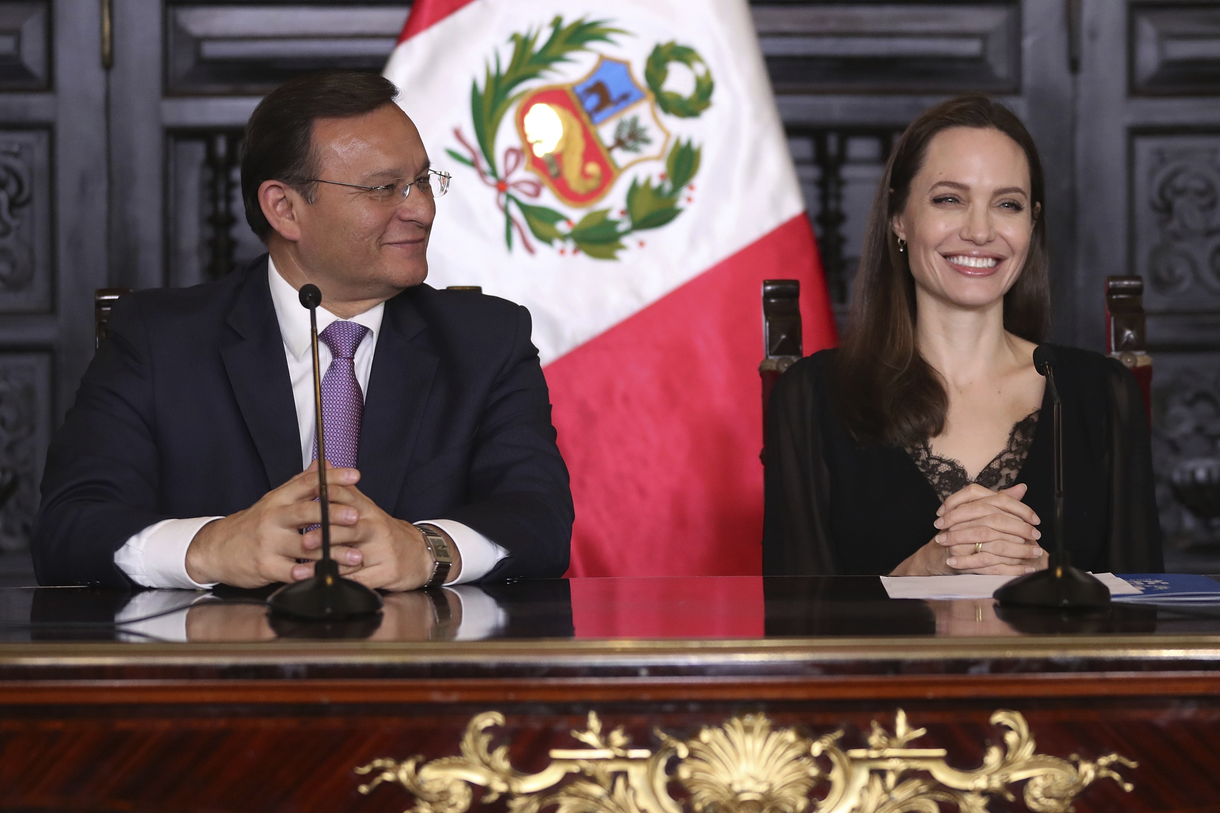 Angelina Jolie and Peru's foreign minister Nestor Popolizio