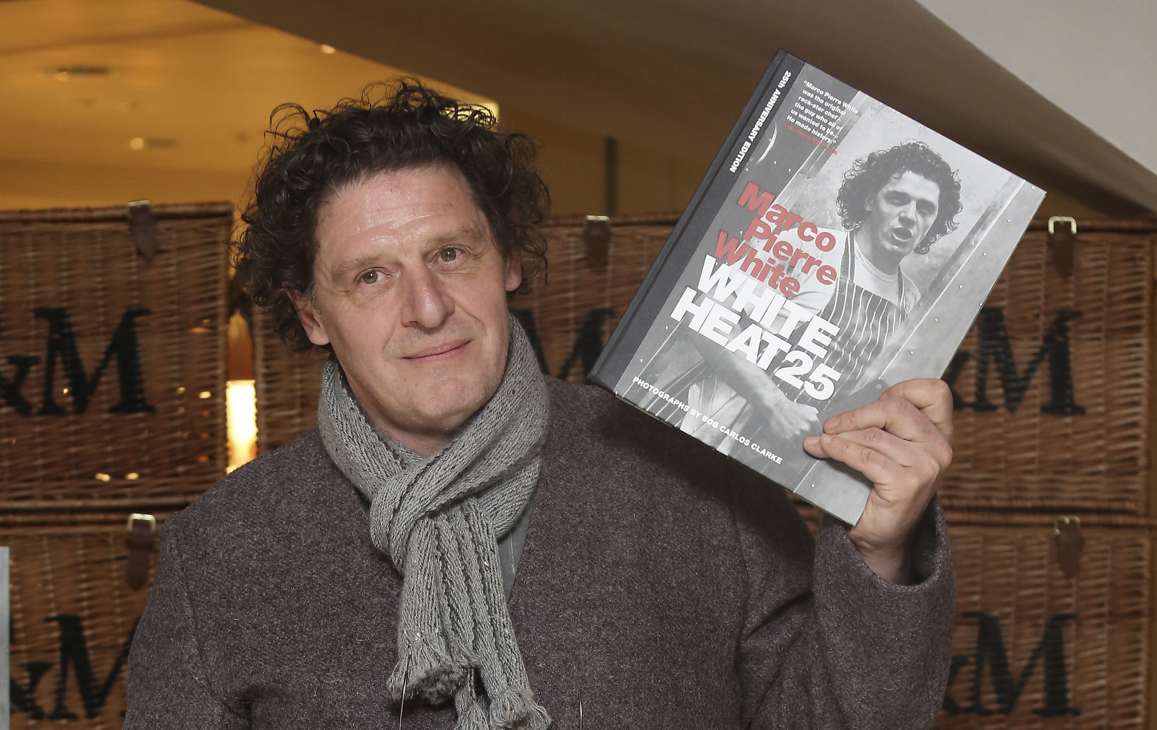 Marco Pierre White at Fortnum & Mason in London, signing his new book White Heat 25, a 25th anniversary edition of his classic cookbook, White Heat (PA)