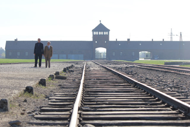 Tarrant and survivor Arek at Auschwitz