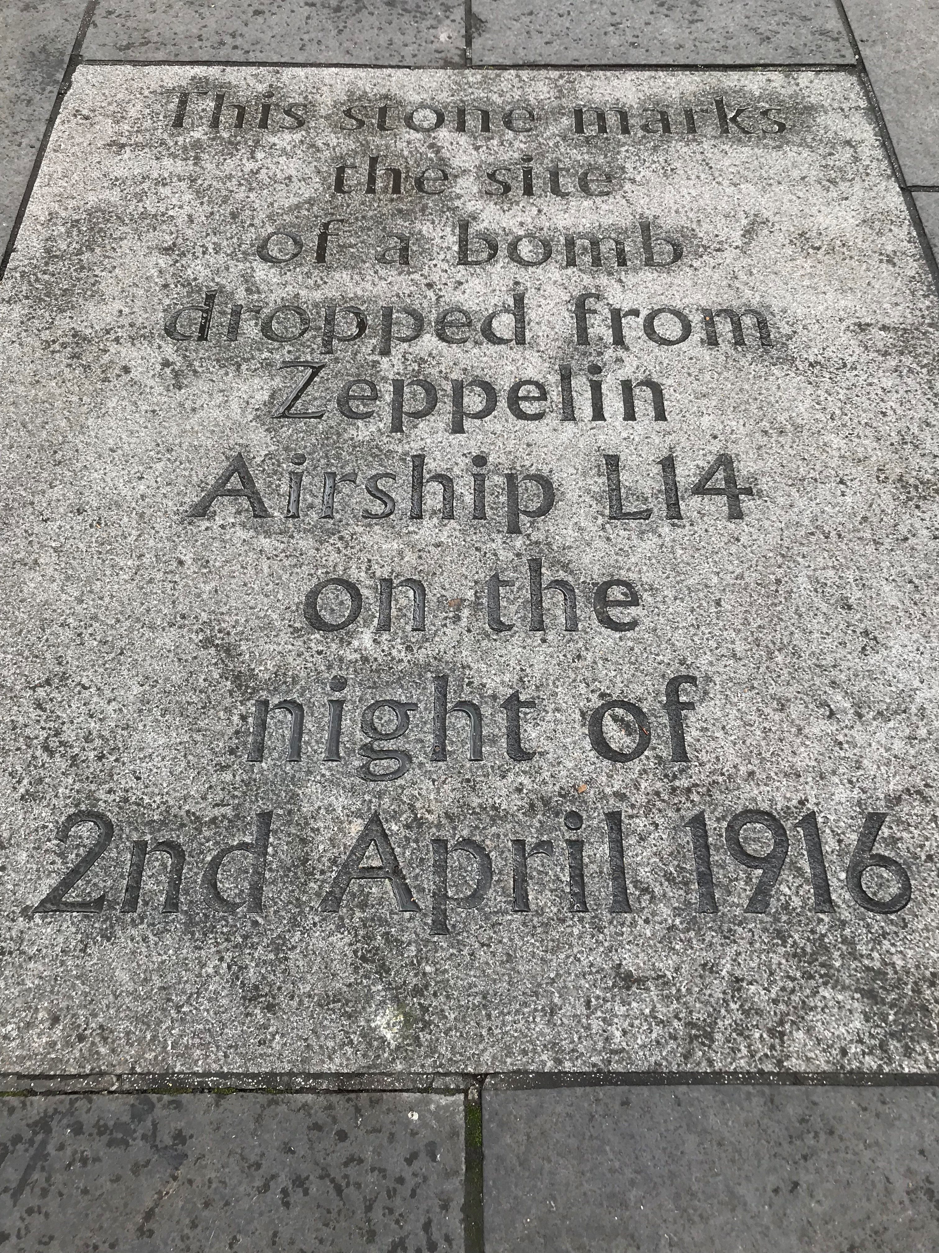 A flagstone marking the spot where a bomb dropped in the Grassmarket