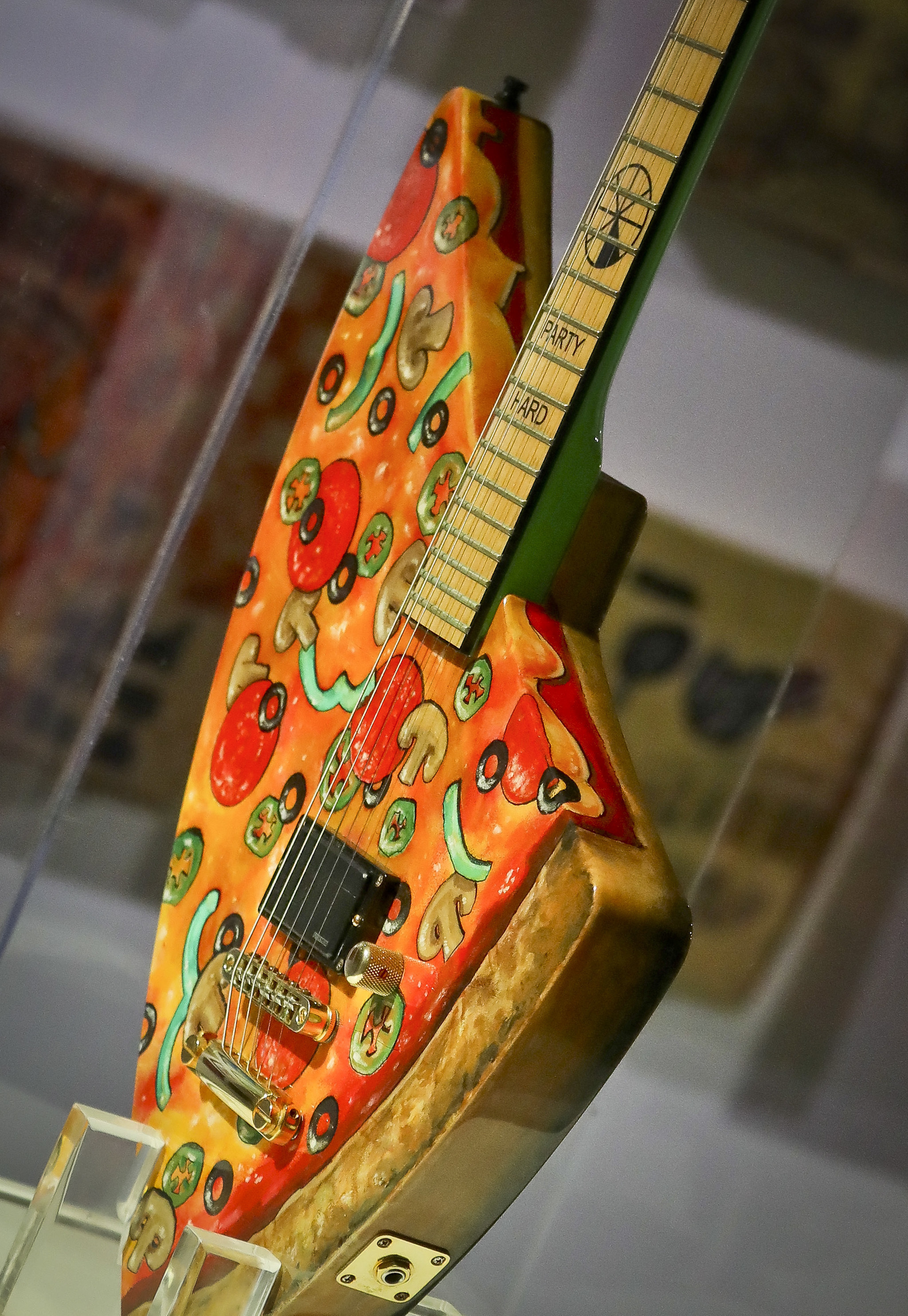 The Pizza Guitar, from musician Andrew WK, part of a group art exhibition celebrating pizza at The Museum of Pizza in New York 