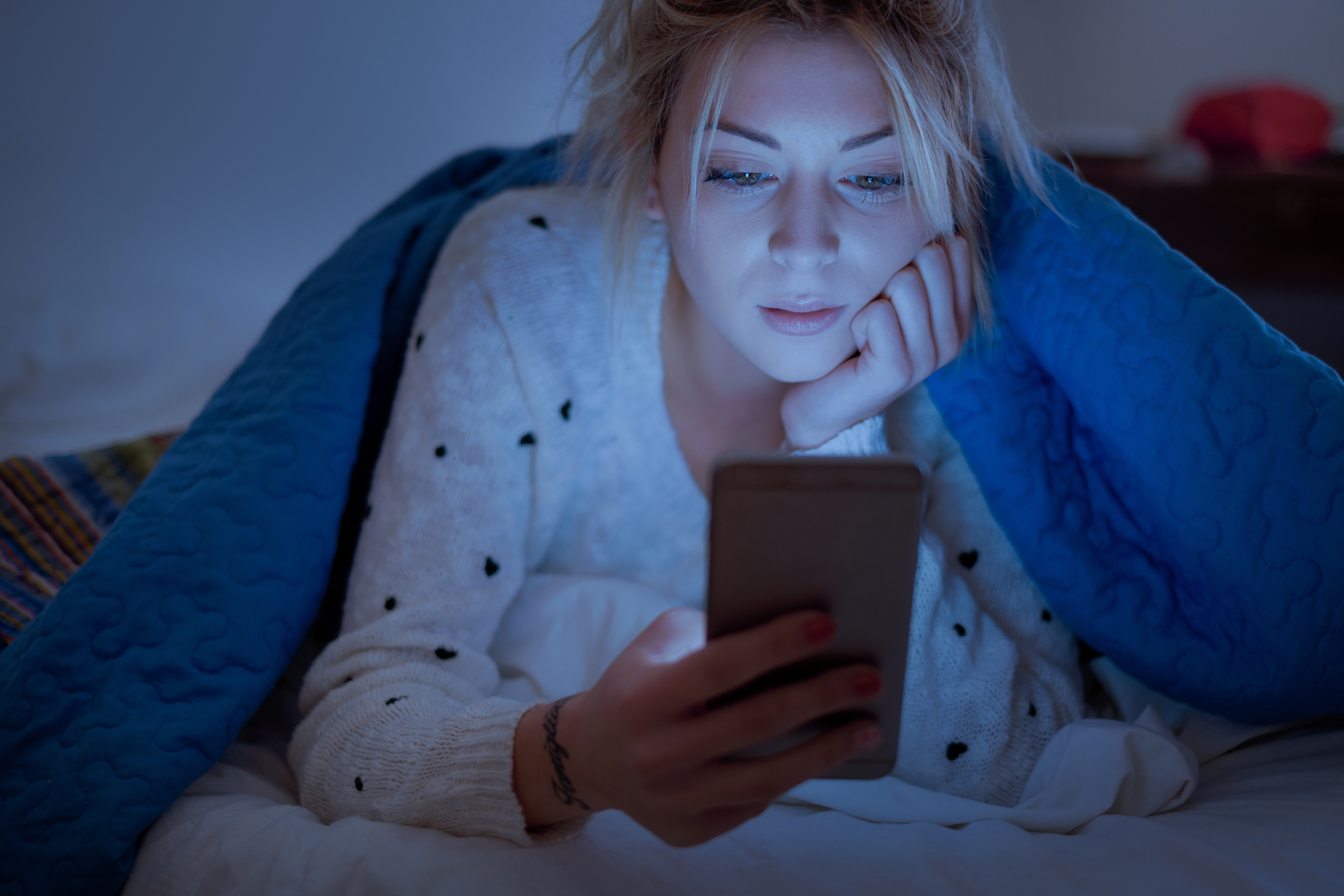 Teenage Girl reading Text Message