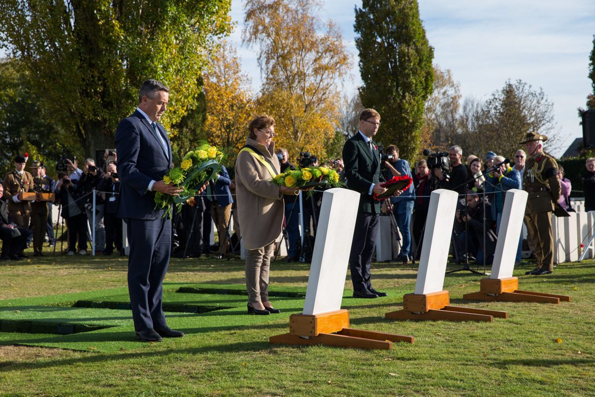 Australian Minister for Veterans' Affairs Darren Chester, MP (left), at a burial ceremony at Tyne Cot Cemetery, Belgium (Commonwealth of Australia/PA)