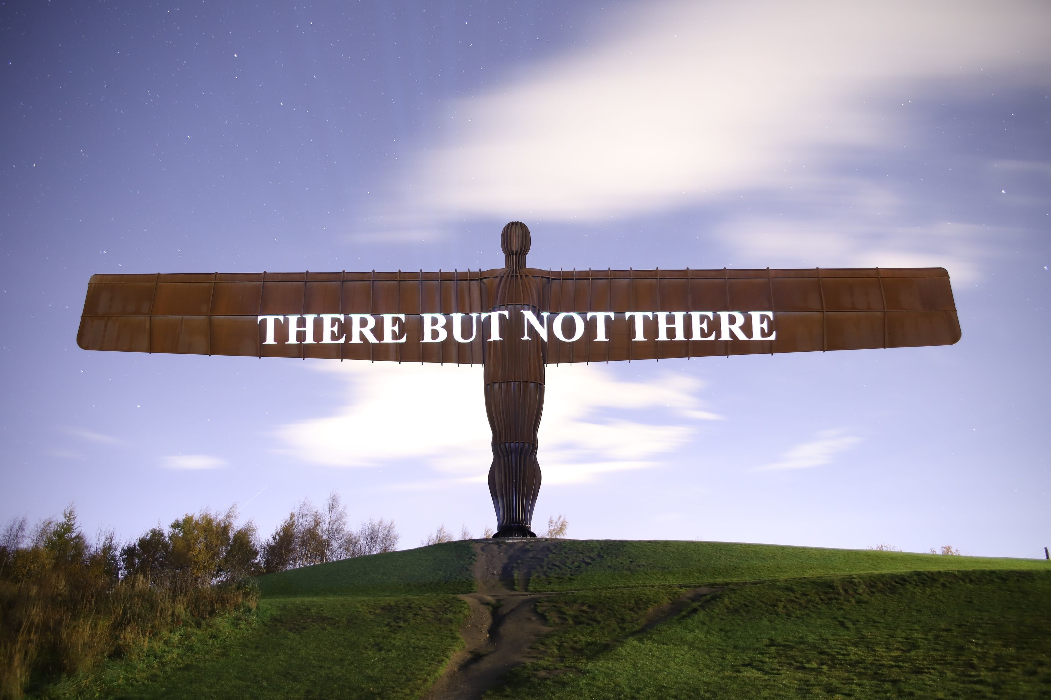 A message commemorating the British and Commonwealth troops who died in the First World War projected on to the Angel of the North