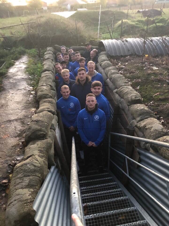 Footballers from England and Germany took part in battlefield and museum tours before their football match on Armistice Day 