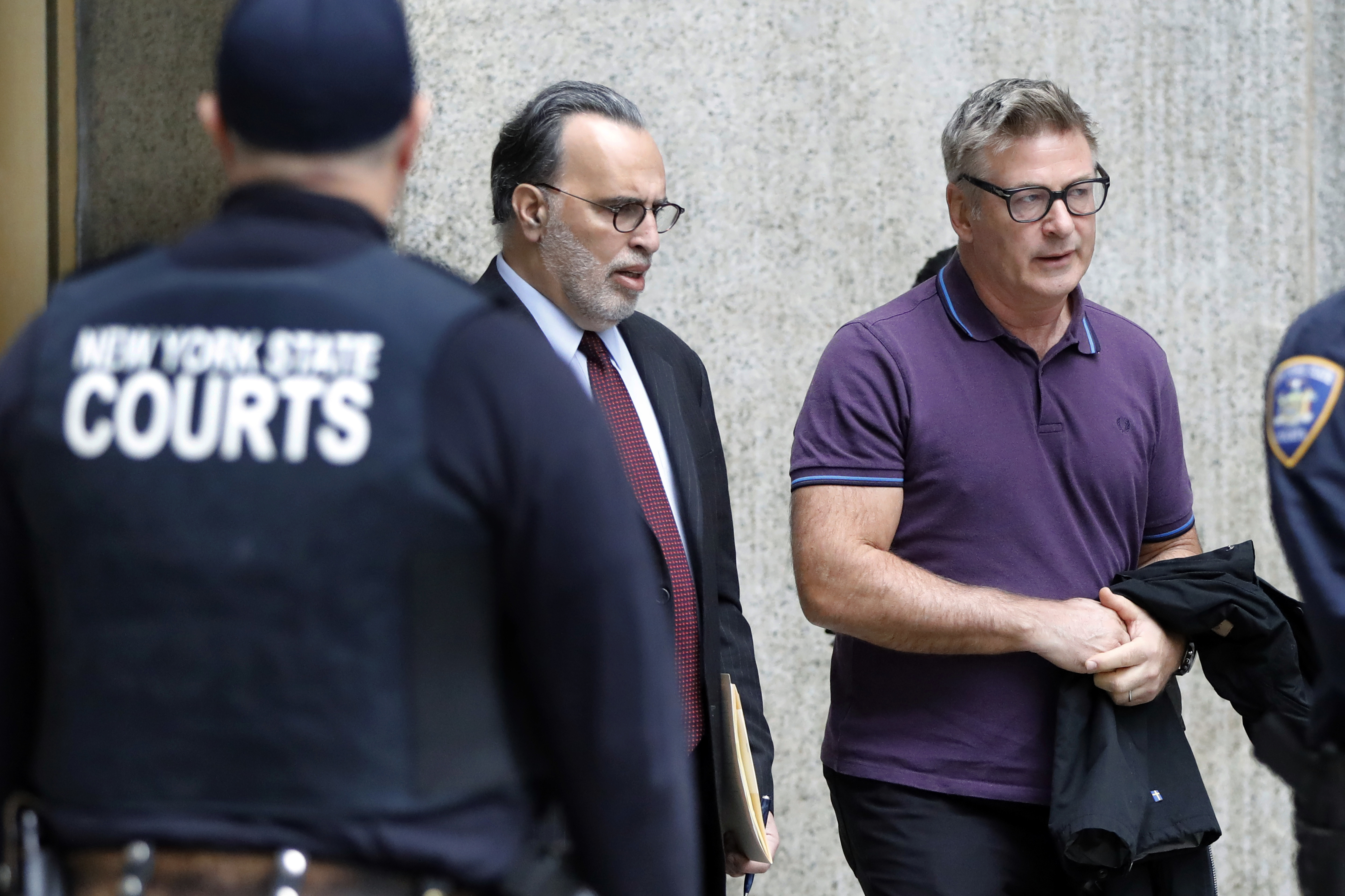 Alec Baldwin and his lawyer Alan Abramson leave New York Supreme