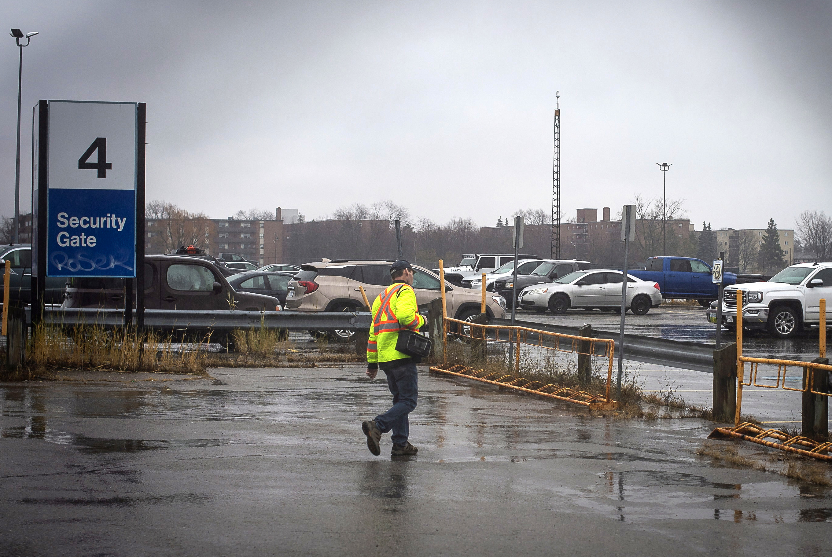 A worker leaves Oshawa's General Motors plant