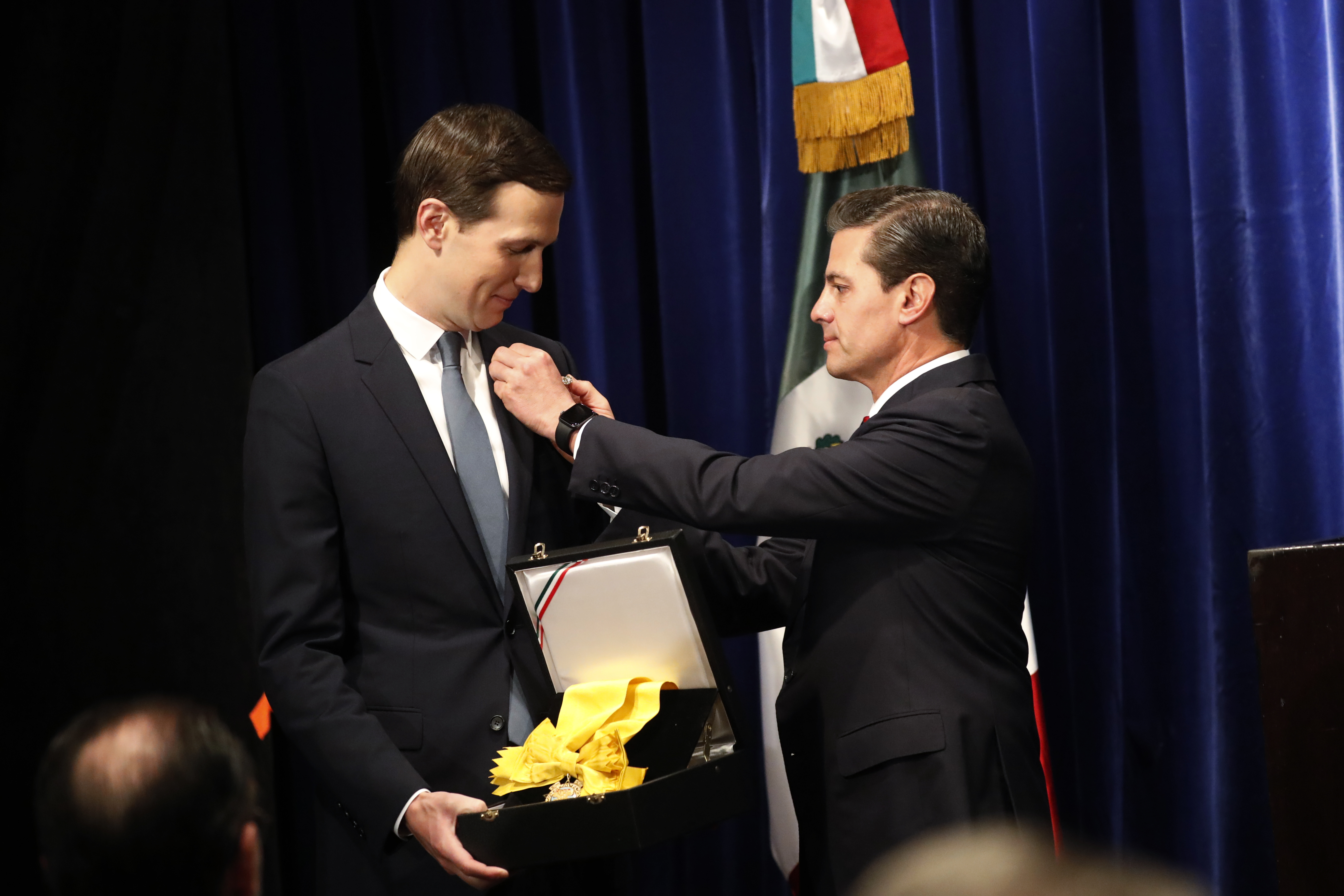 Mexican President Enrique Pena Neto, right, awards White House Senior Adviser Jared Kushner the Order of the Aztec Eagle