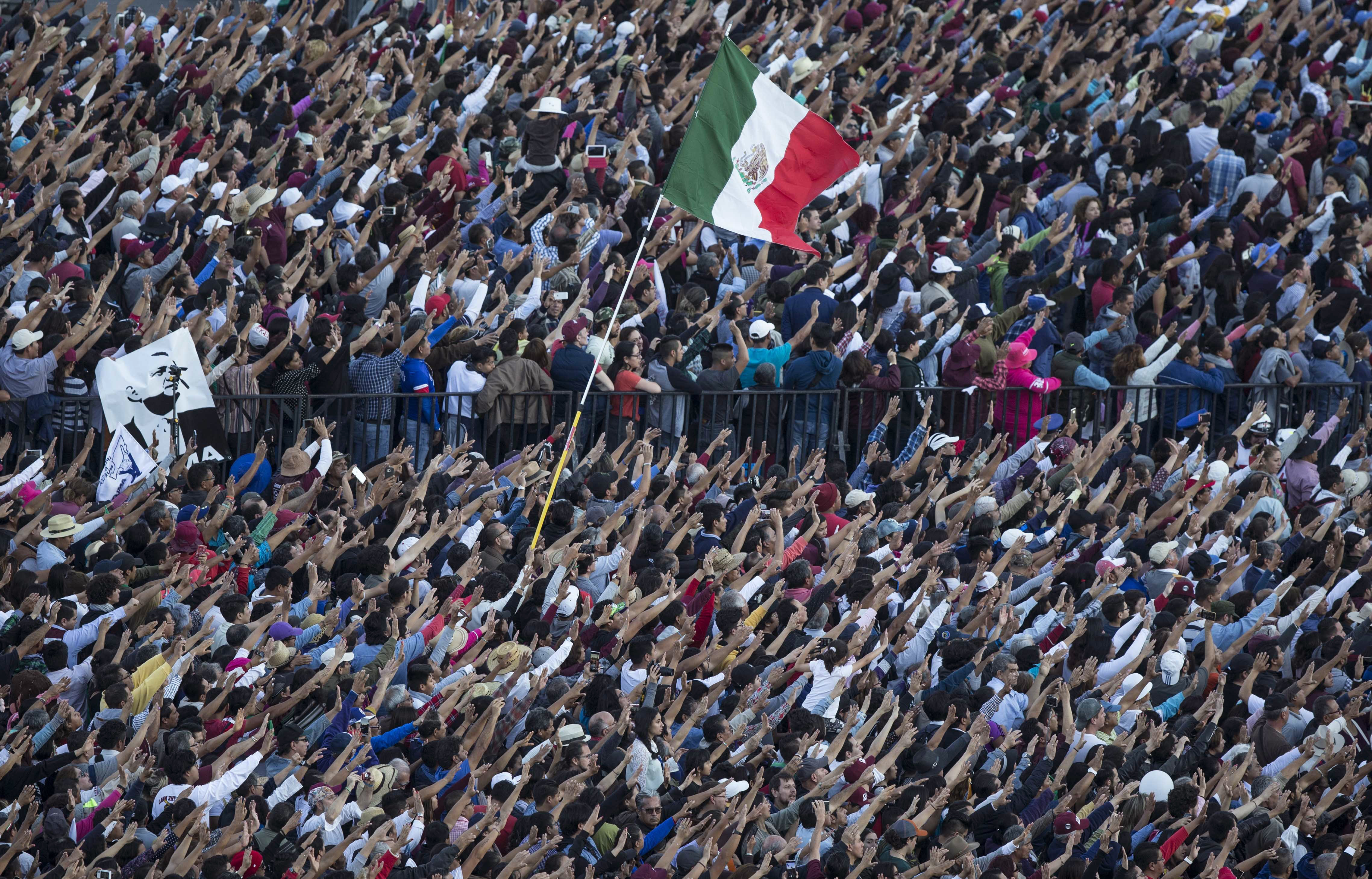 Celebrants take part in a traditional ceremony in which Mexico's newly sworn-in president Andres Manuel Lopez Obrador is formally anointed leader by indigenous groups at the Zocalo in Mexico City