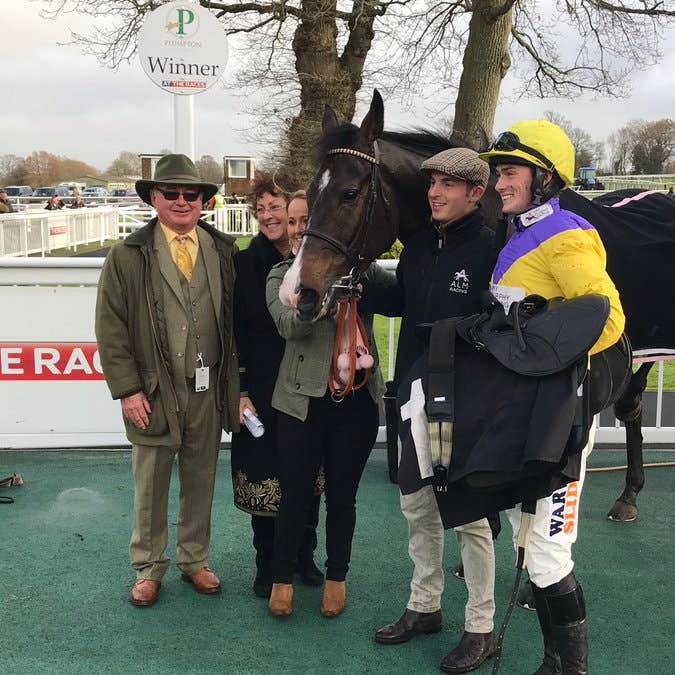 Kalashnikov and connections after his victory in Plumpton's Sky Sports Racing Novices' Chase