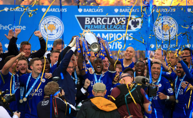 Claudio Ranieri and his players with the Premier League trophy