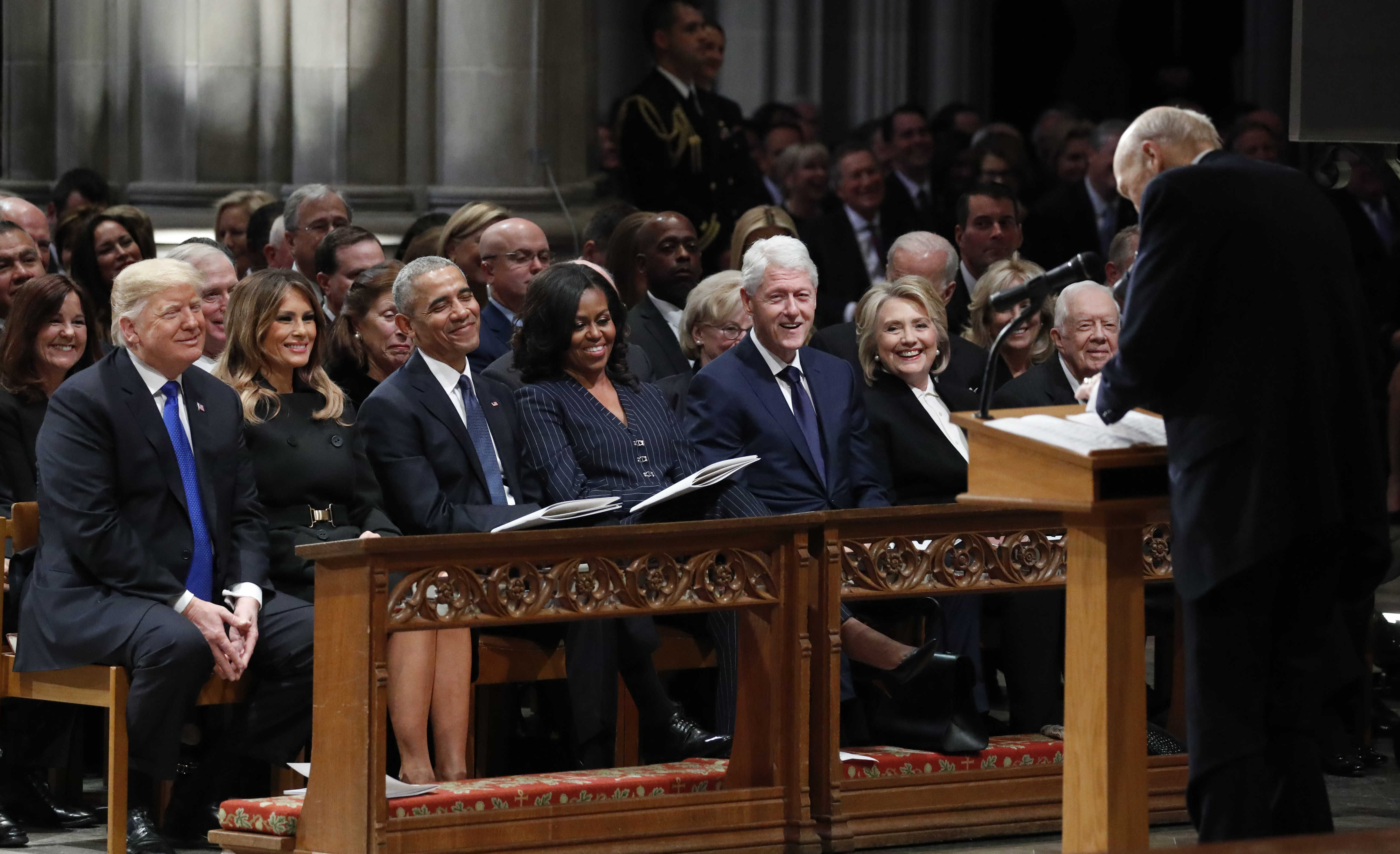 President Donald Trump, first lady Melania Trump, former President Barack Obama, Michelle Obama, former President Bill Clinton, former Secretary of State Hillary Clinton, and former President Jimmy Carter at a funeral 