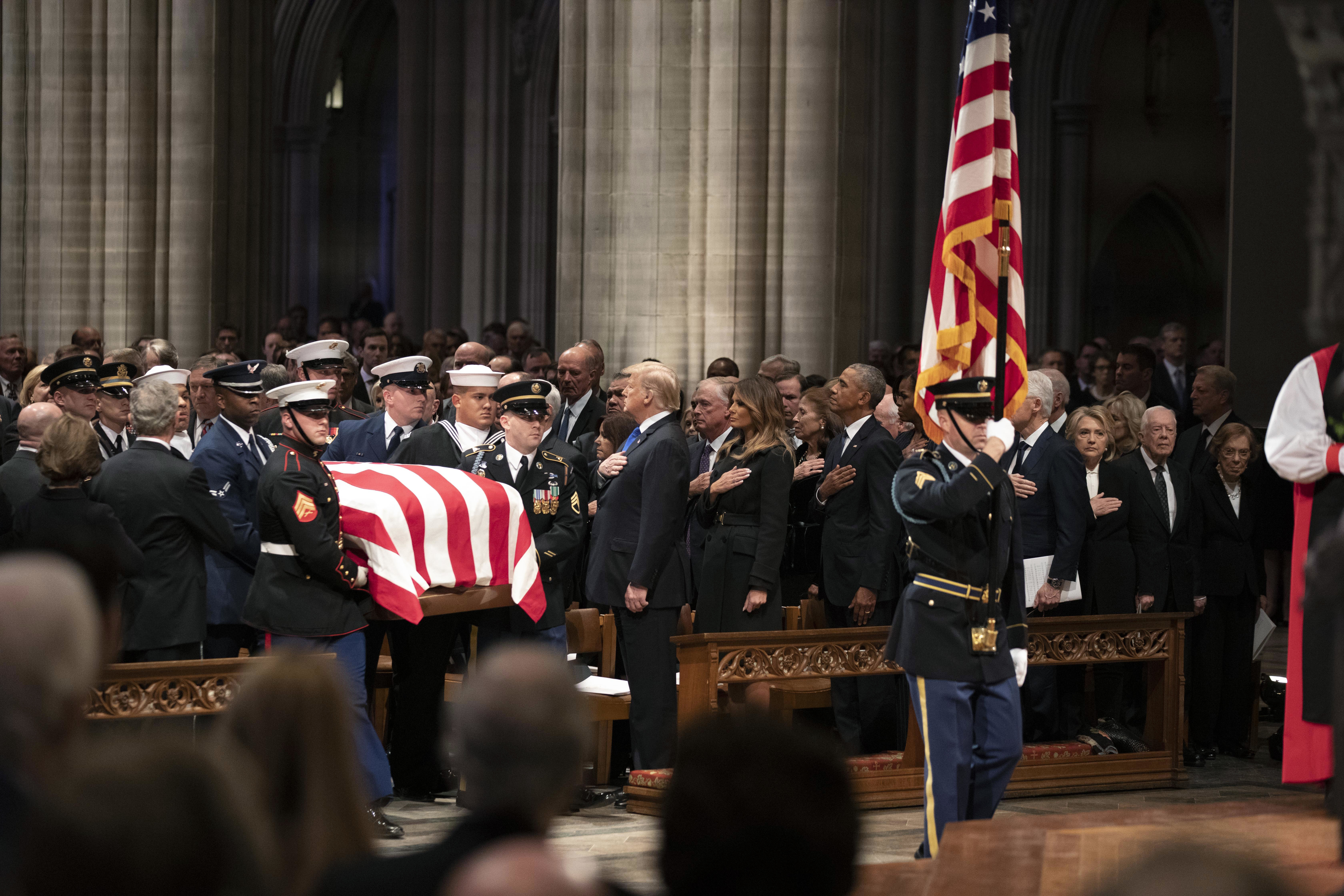 The flag-draped coffin of former president George HW Bush 