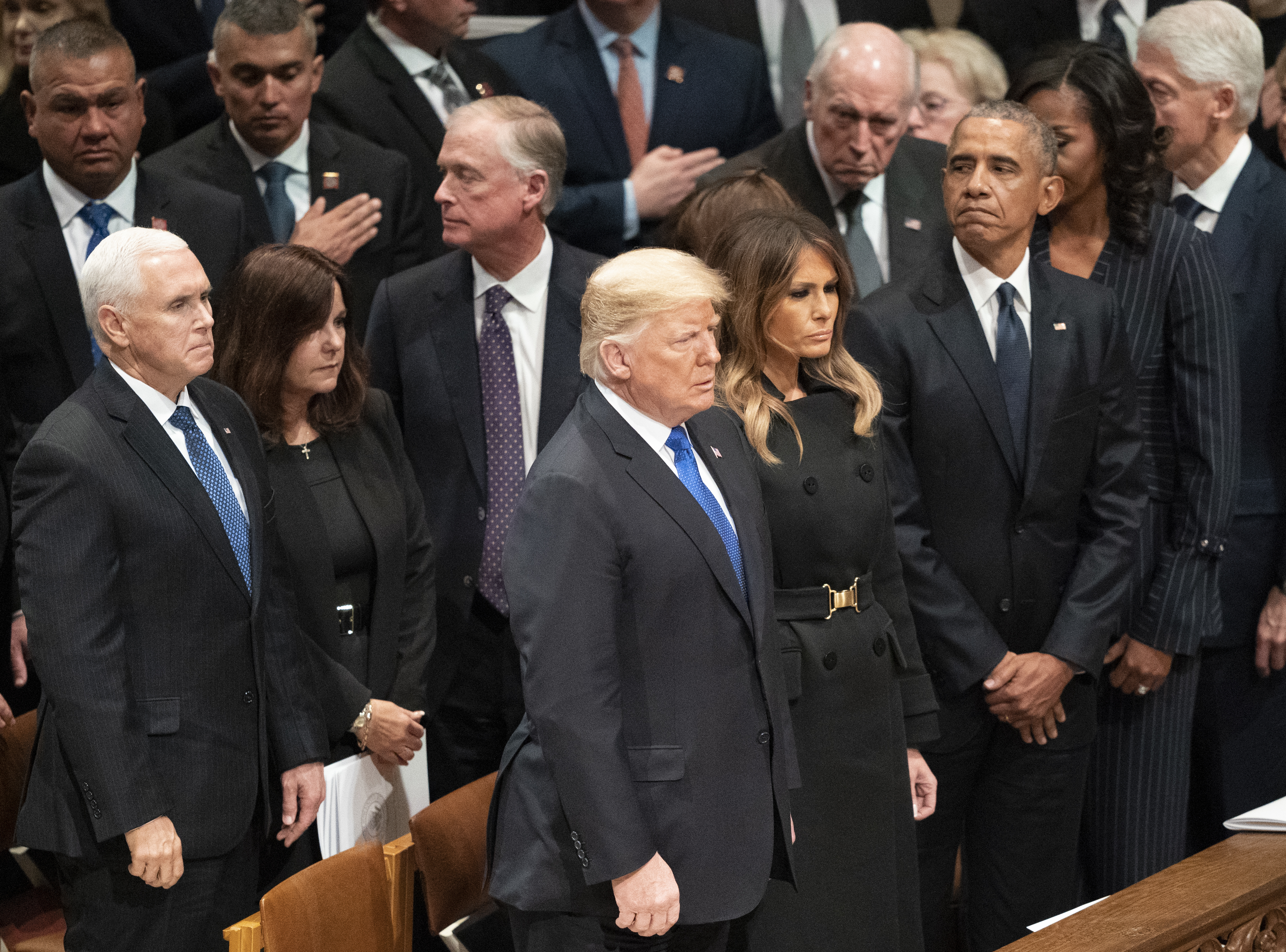President Donald Trump, first lady Melania Trump, former President Barack Obama, Michelle Obama, former President Bill Clinton, stand at the end of a State Funeral for former President George HW Bush
