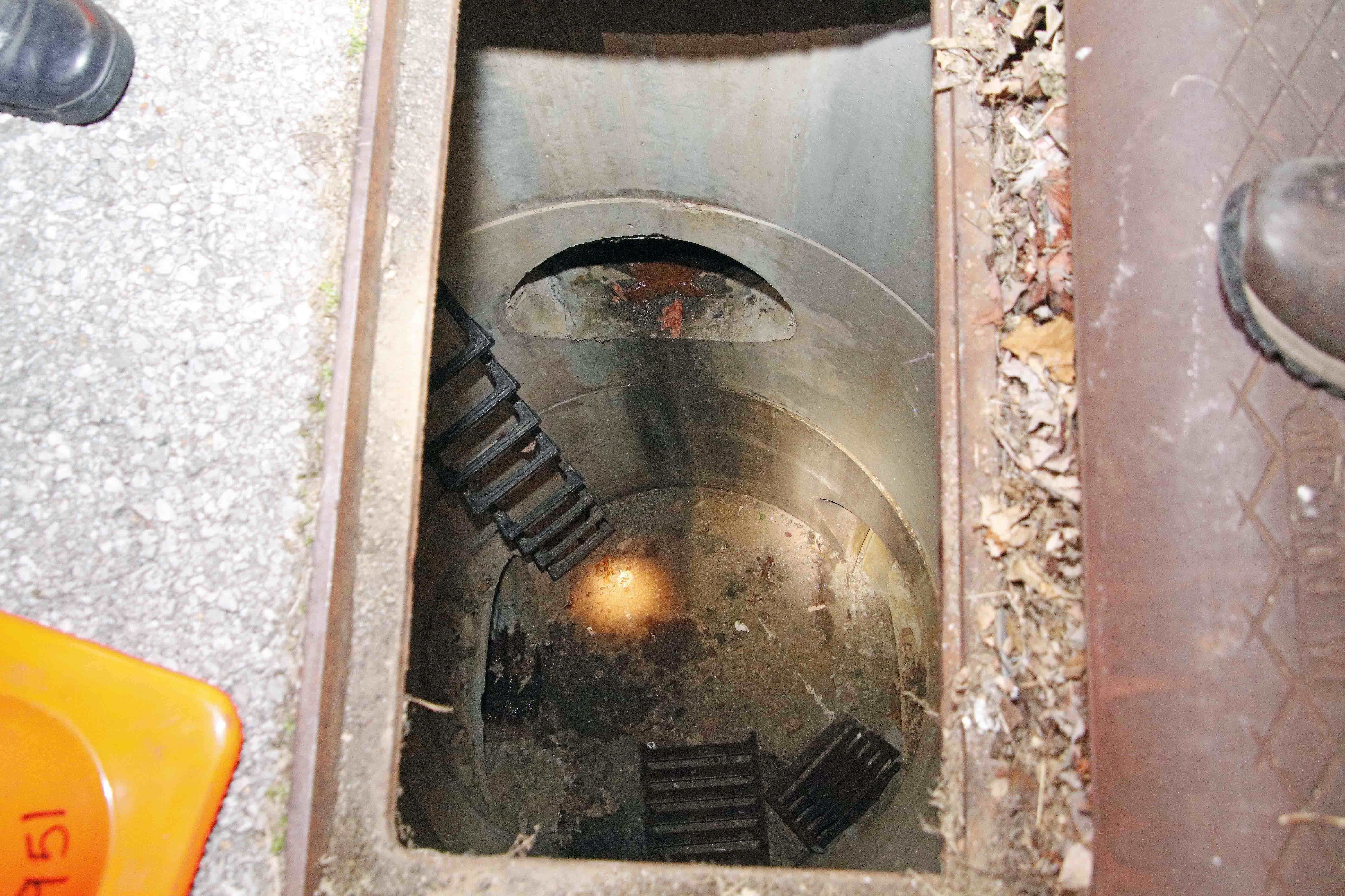 A storm drain which a woman and her baby were rescued from