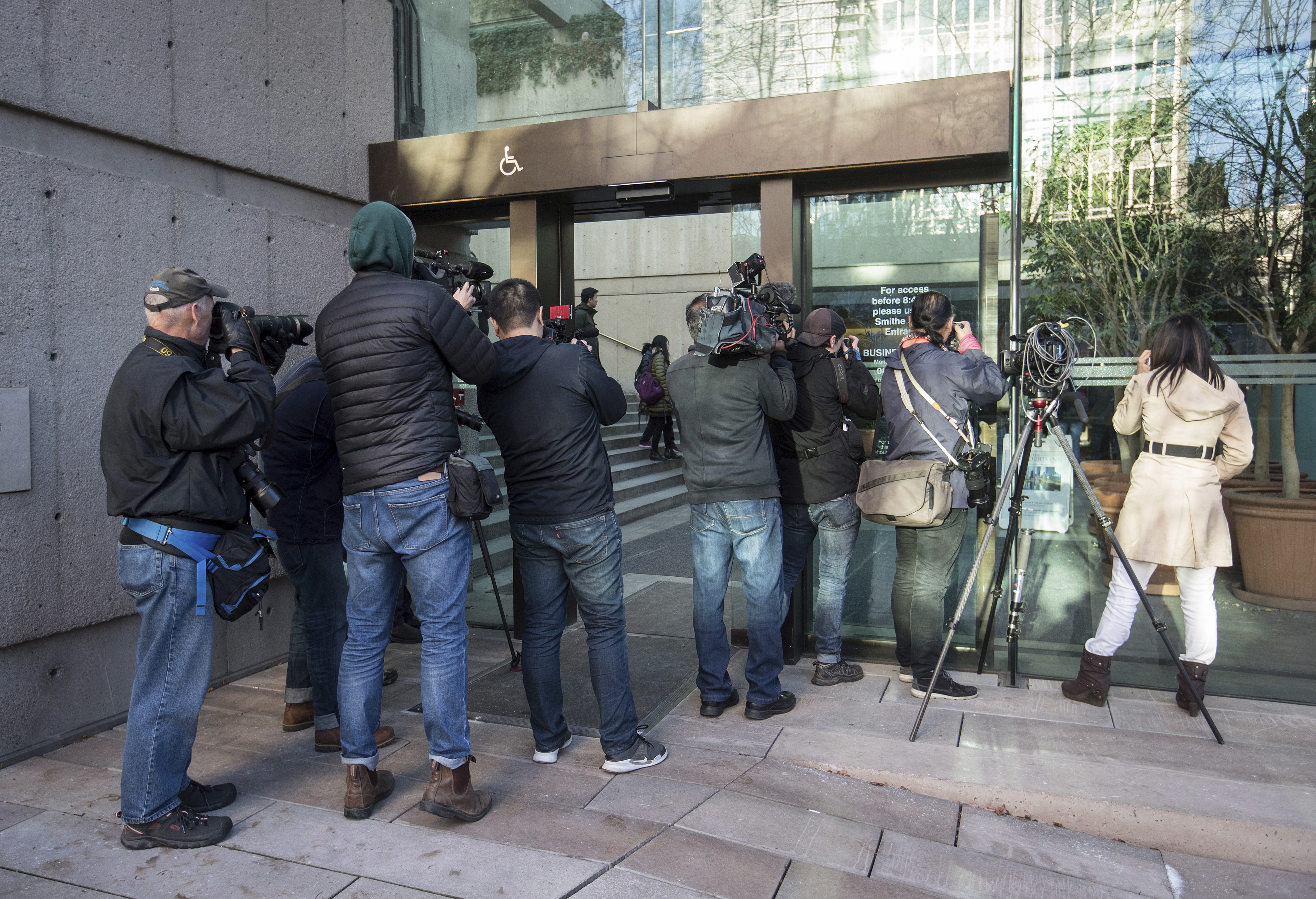 Members of the media outside the bail hearing in Vancouver for Huawei's Meng Wanzhou 