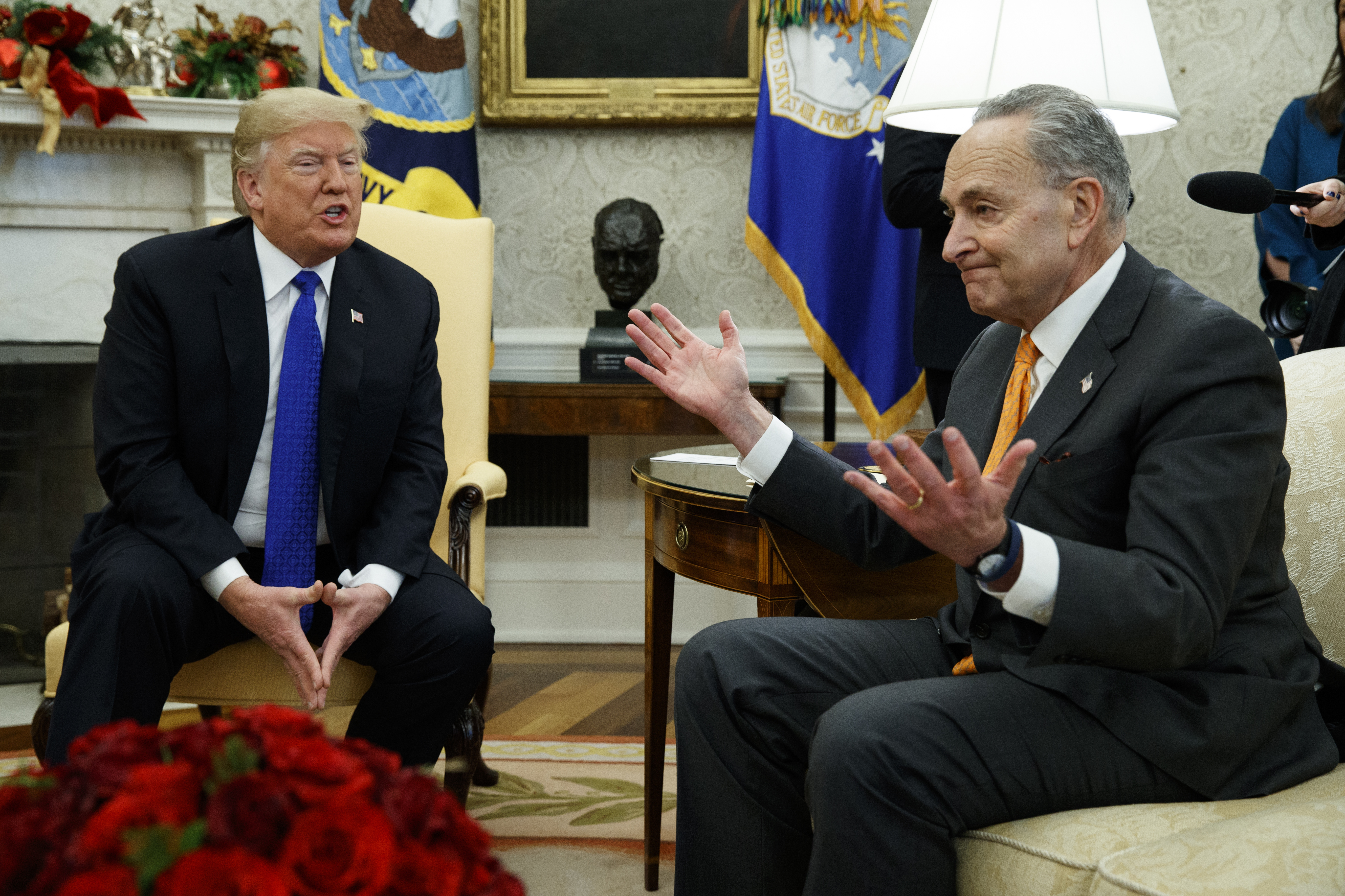 President Donald Trump talks with Senate Minority Leader Chuck Schumer, D-N.Y., during a meeting in the Oval Office of the White House