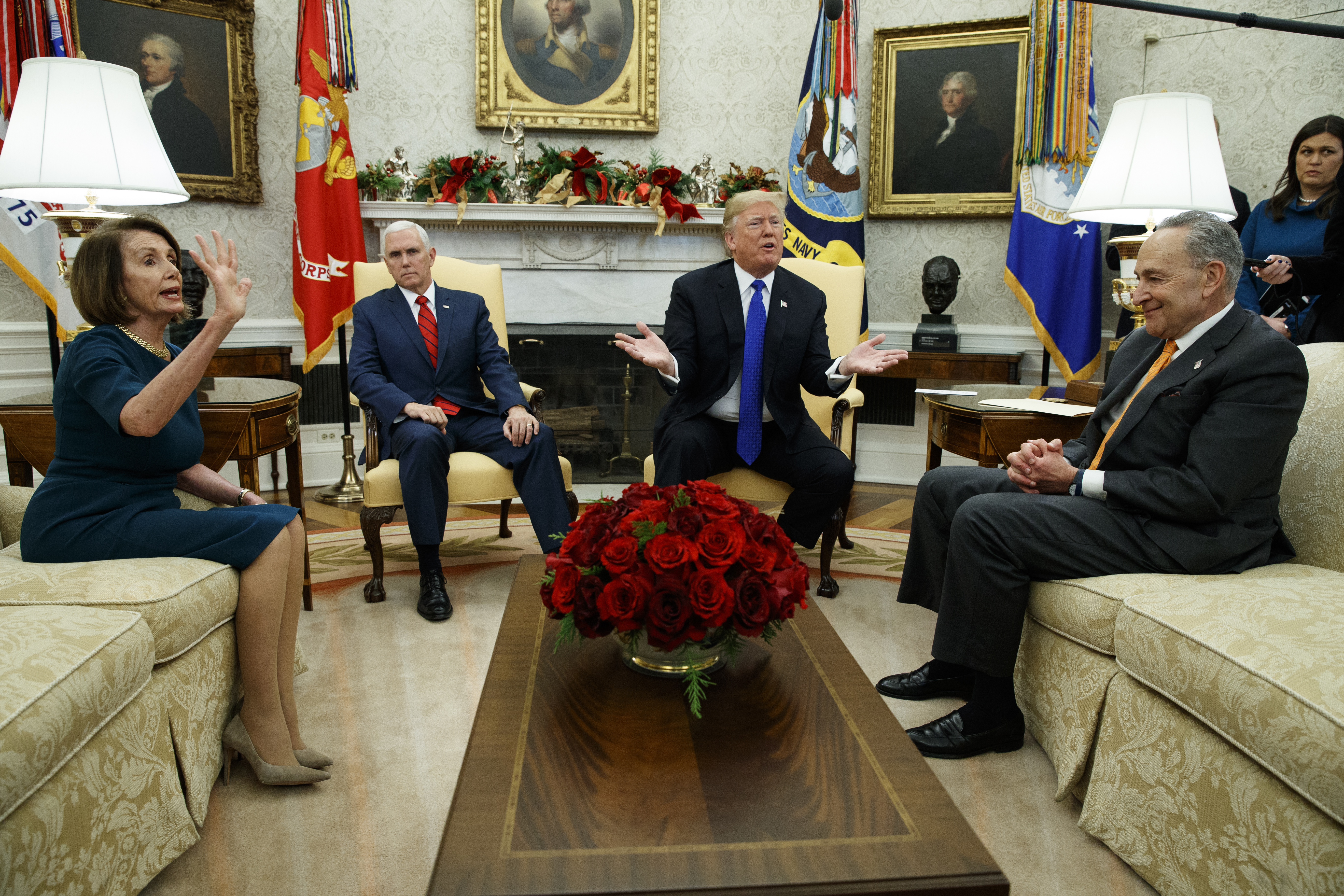 House Minority Leader Rep. Nancy Pelosi, D-Calif., Vice President Mike Pence, President Donald Trump, and Senate Minority Leader Chuck Schumer, D-N.Y., argue during a meeting in the Oval Office of the White House